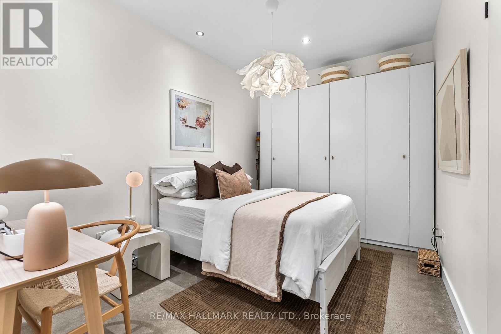 202 - 747 QUEEN STREET E
