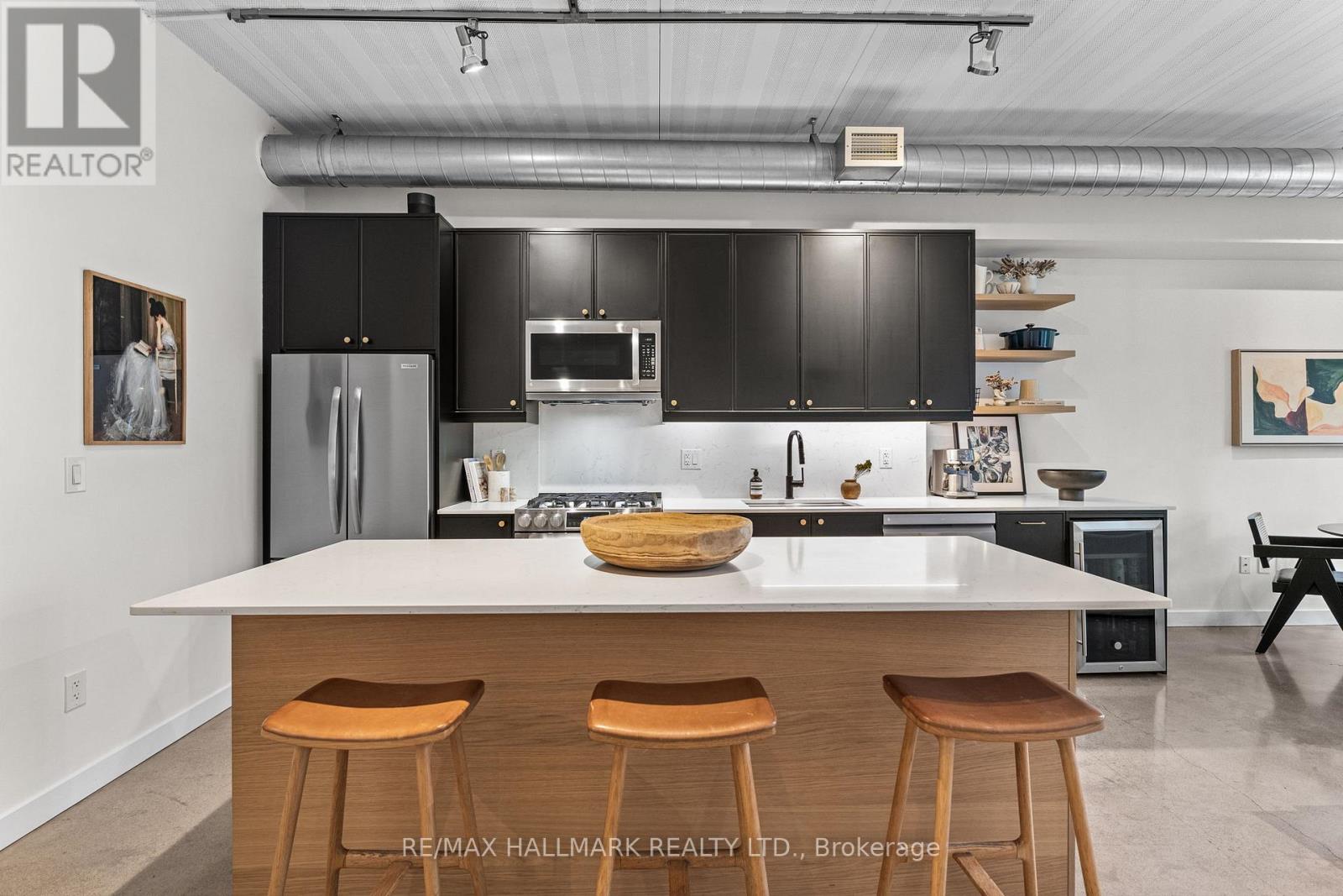 202 - 747 QUEEN STREET E