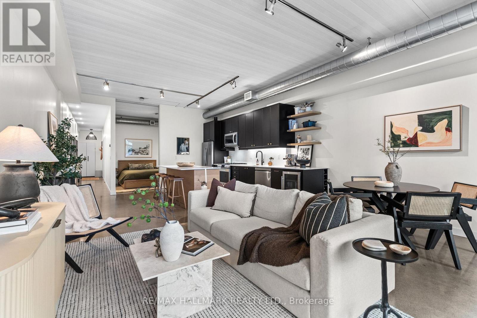 202 - 747 QUEEN STREET E