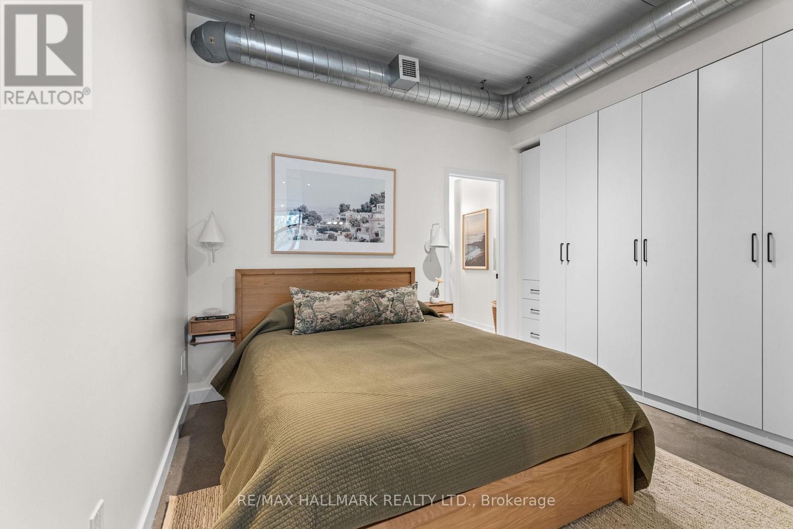202 - 747 QUEEN STREET E