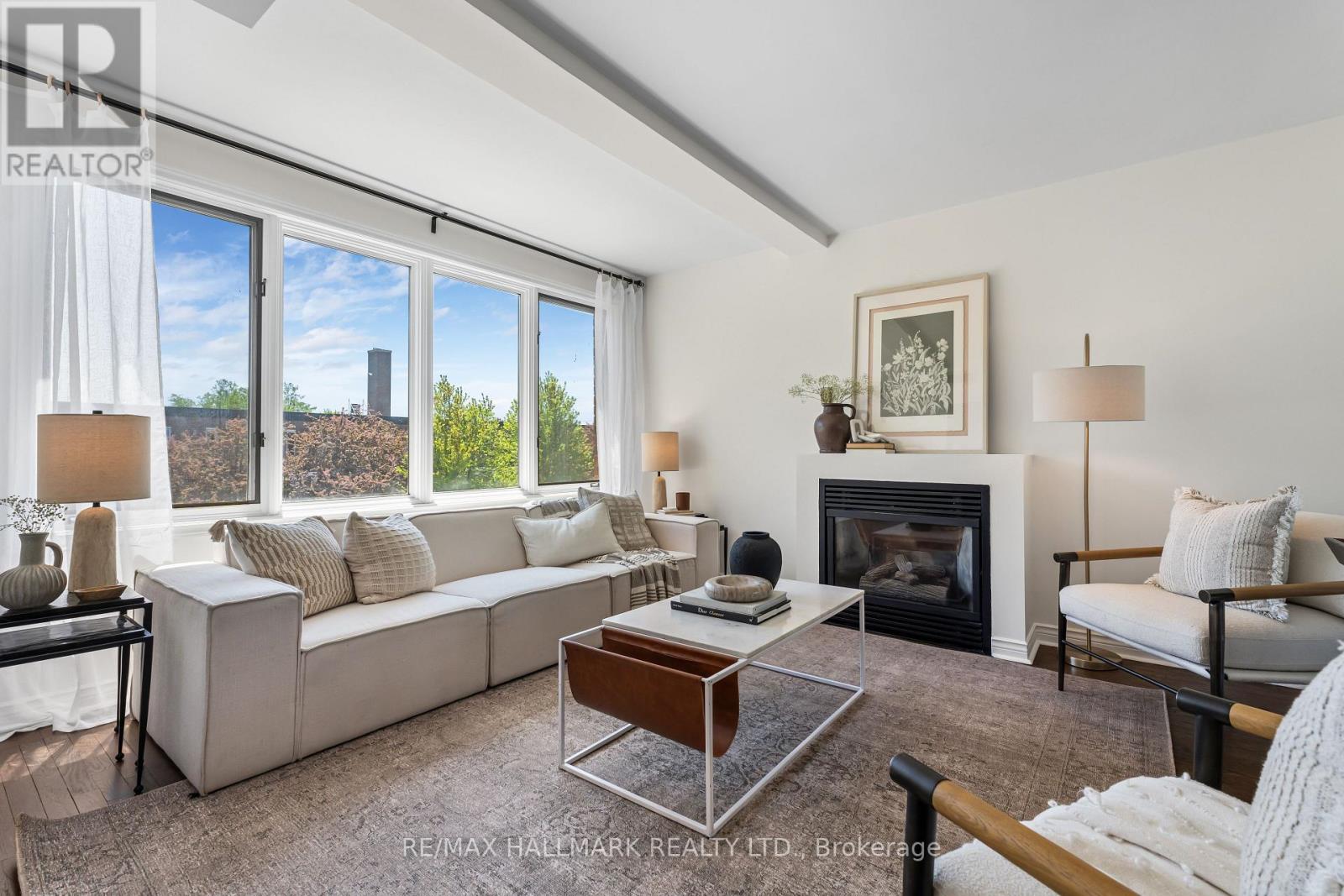 305 - 1941 QUEEN STREET E