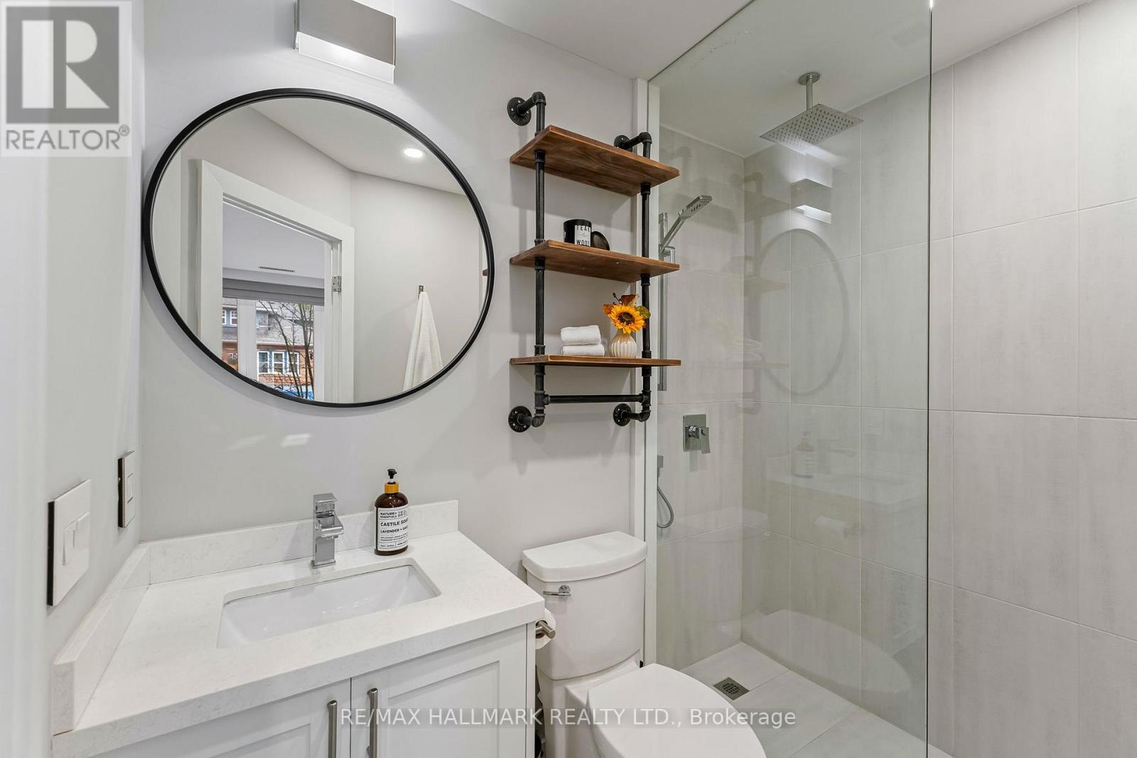 201 - 2365 QUEEN STREET E