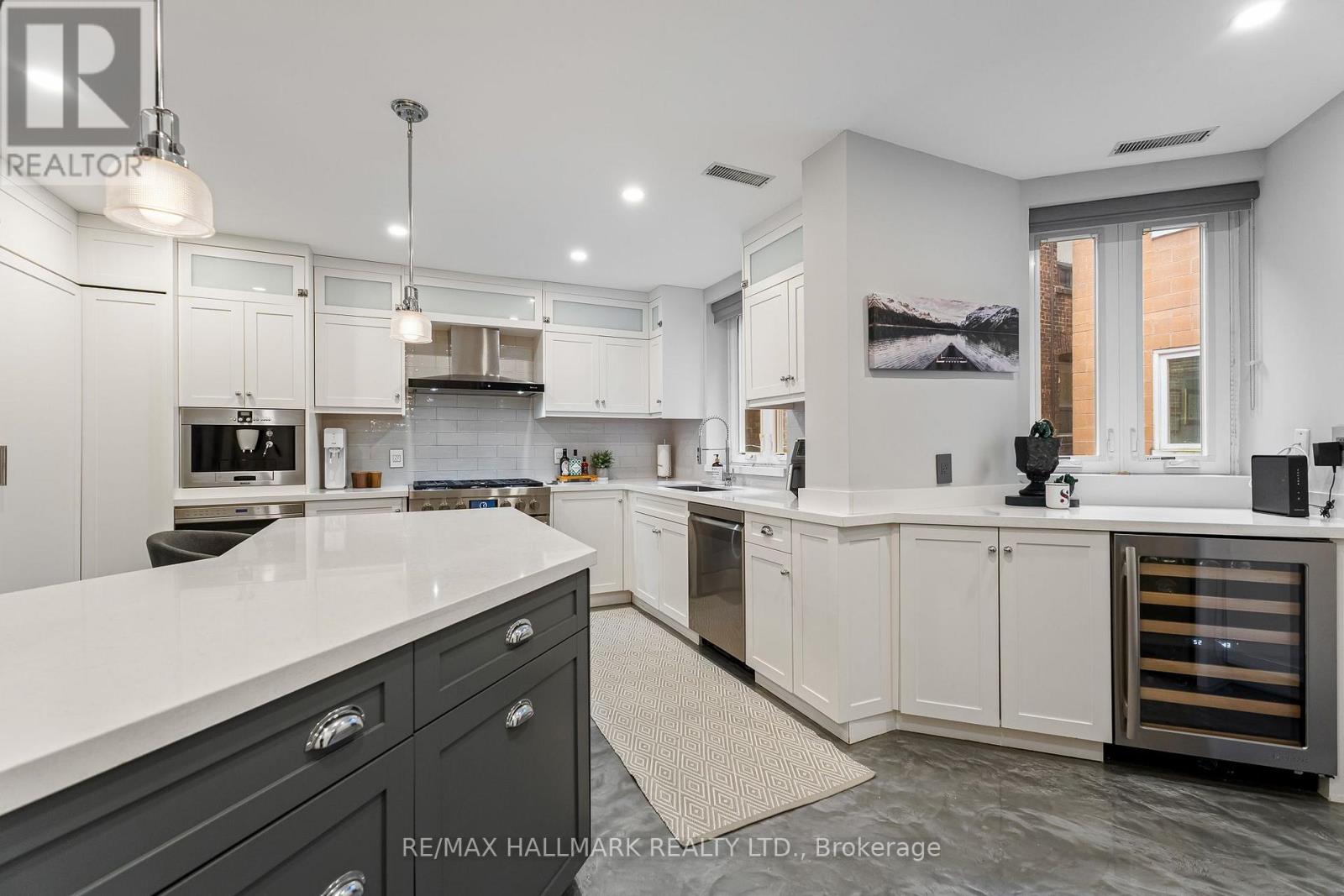 201 - 2365 QUEEN STREET E