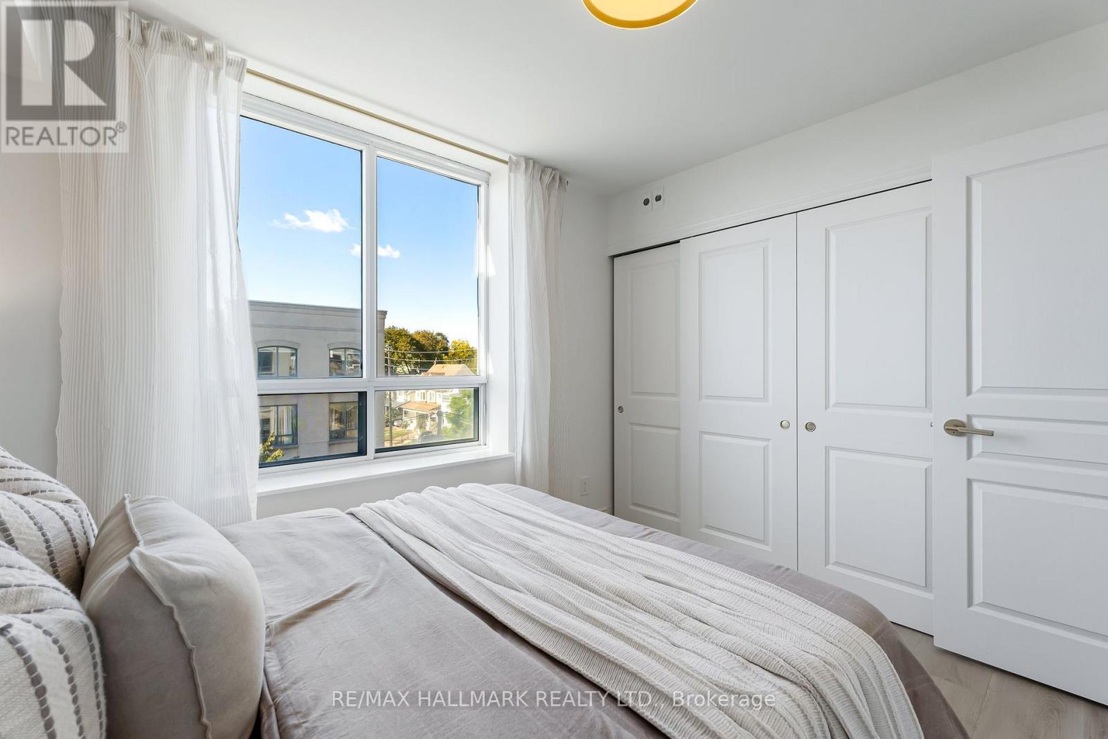 404 - 1797 QUEEN STREET E