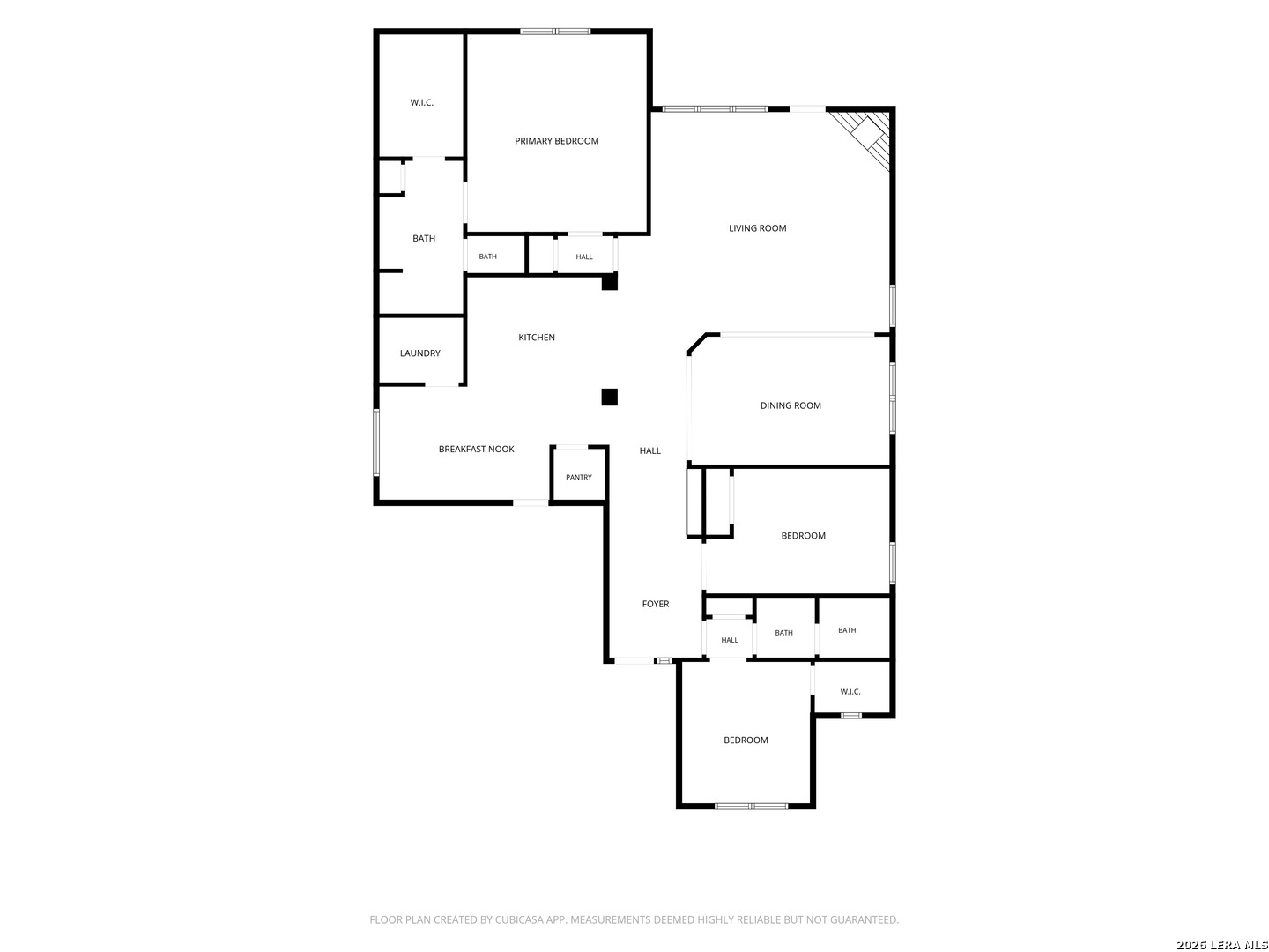 Floor plan showing three bedrooms, living and dining rooms, kitchen, breakfast nook, laundry, and bathrooms.