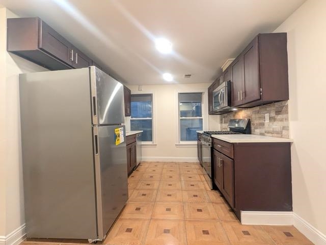377 OGDEN AVE Unit: 1