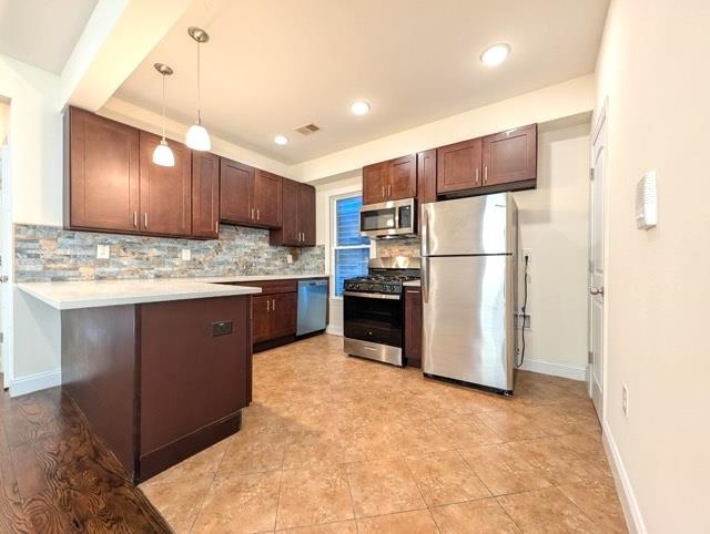 377 OGDEN AVE Unit: 3