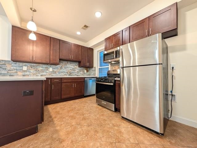 377 OGDEN AVE Unit: 3