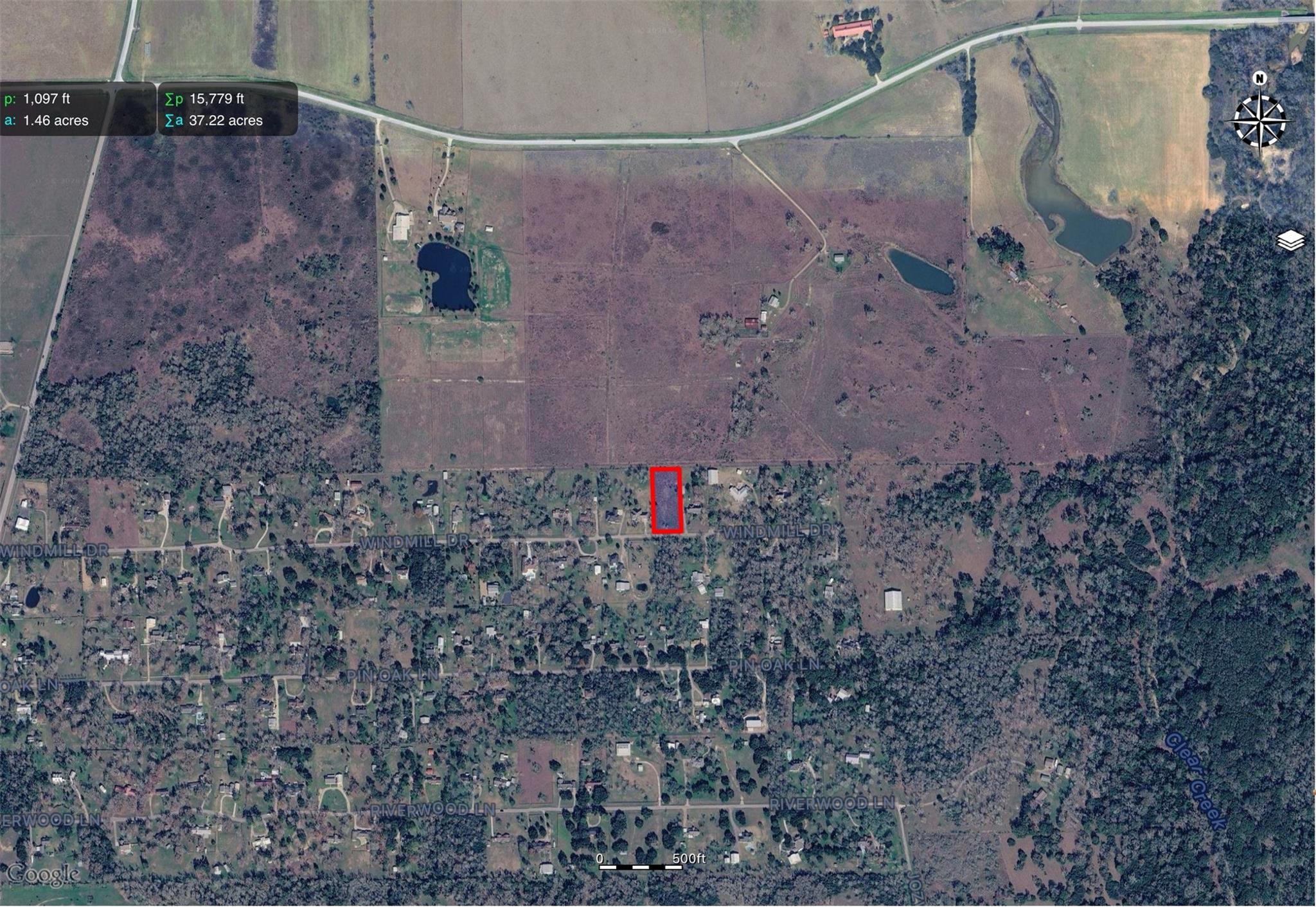 Aerial map showing a red-outlined 1.46-acre lot on Windmill Drive amid rural fields and scattered homes.