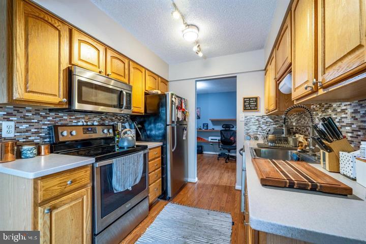 10200 BUSHMAN DR #114