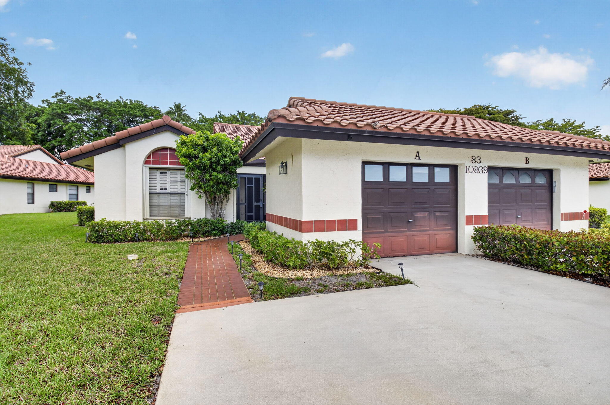 10939 Roebelini Palm Court A
