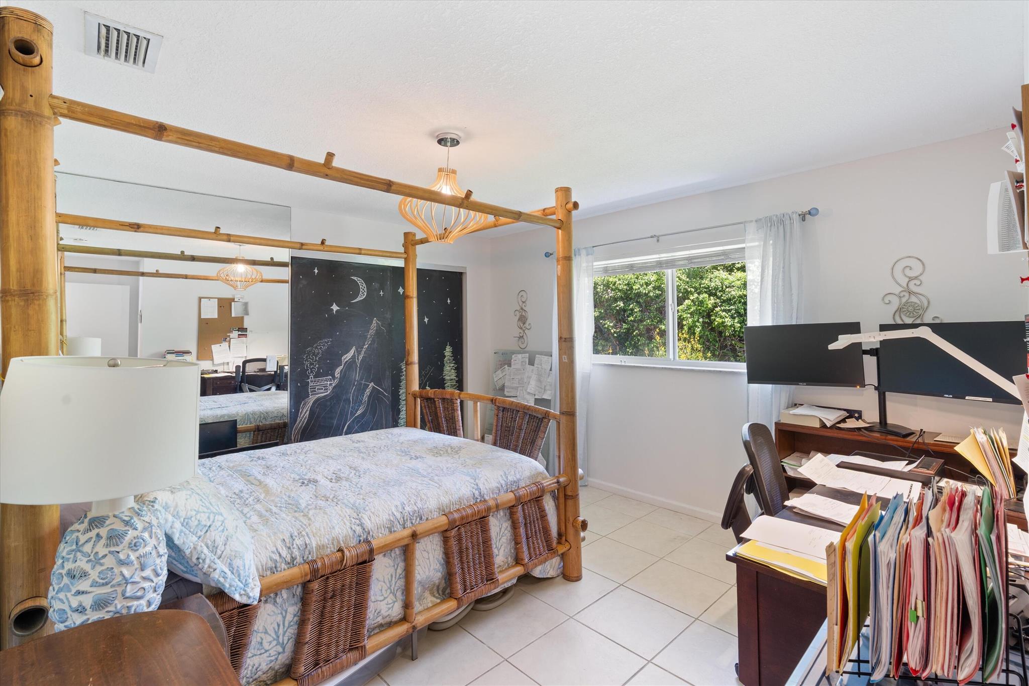 830 NE Boca Bay Colony Drive