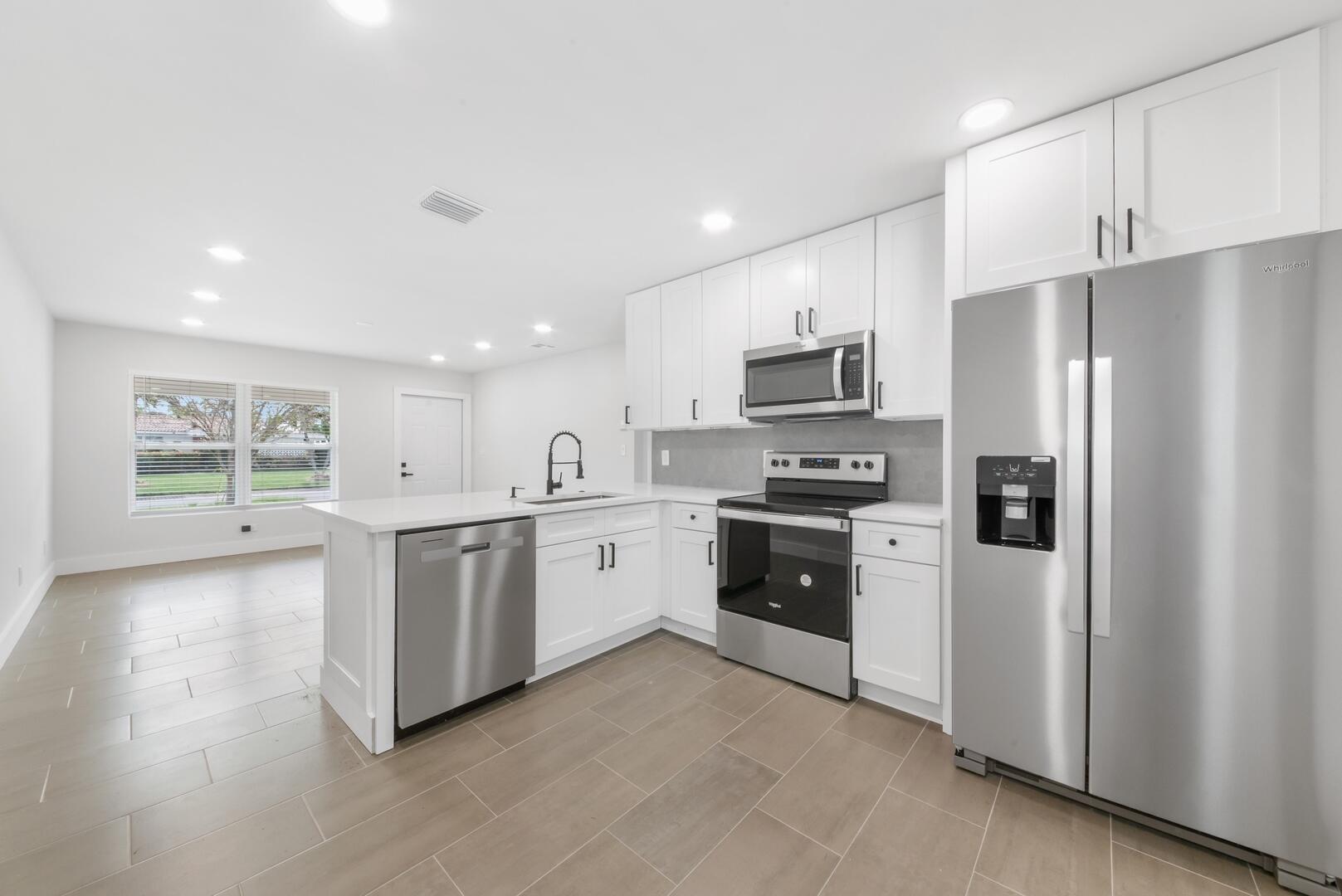 823-825 NW 30th Court 1-2