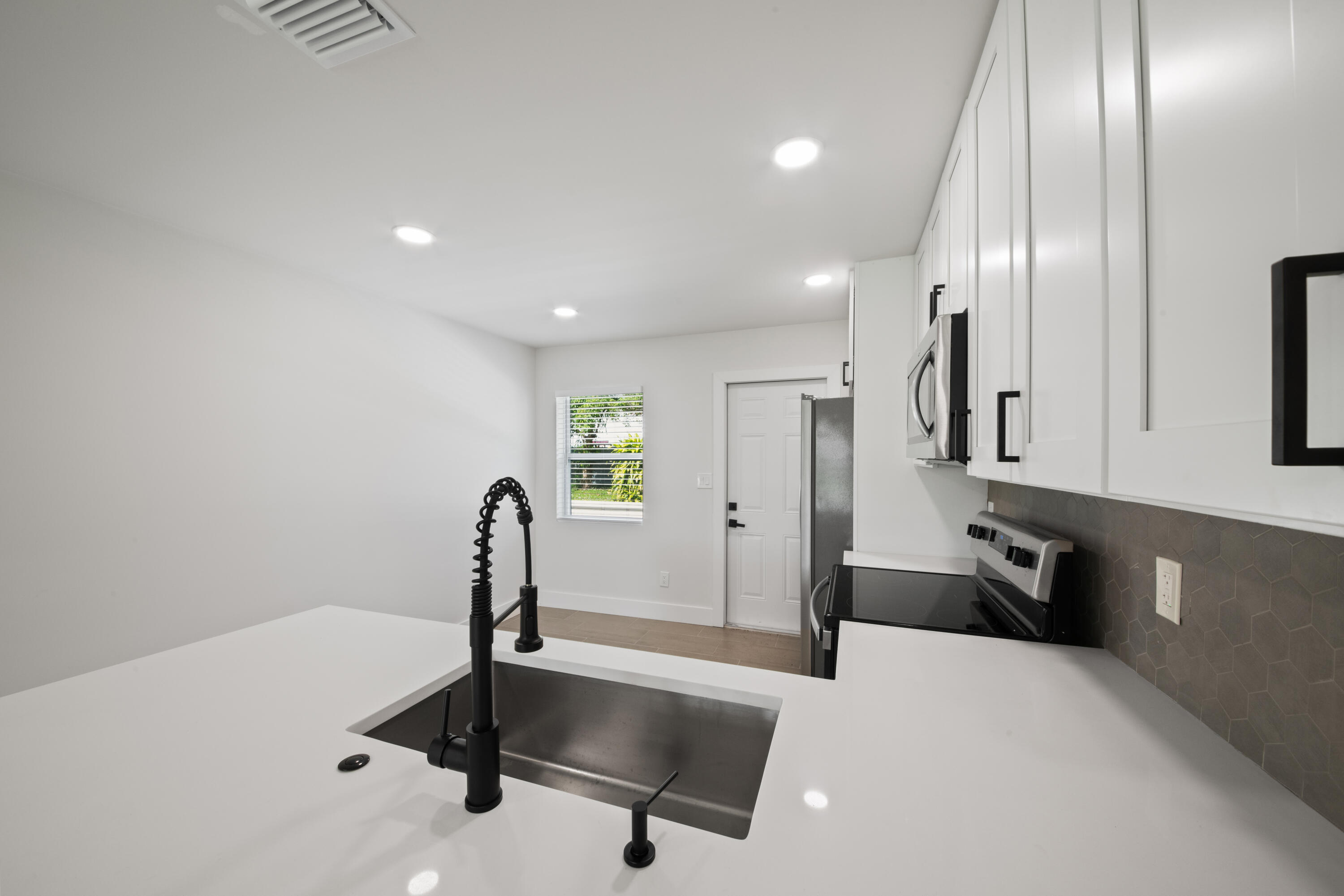 823-825 NW 30th Court 1-2
