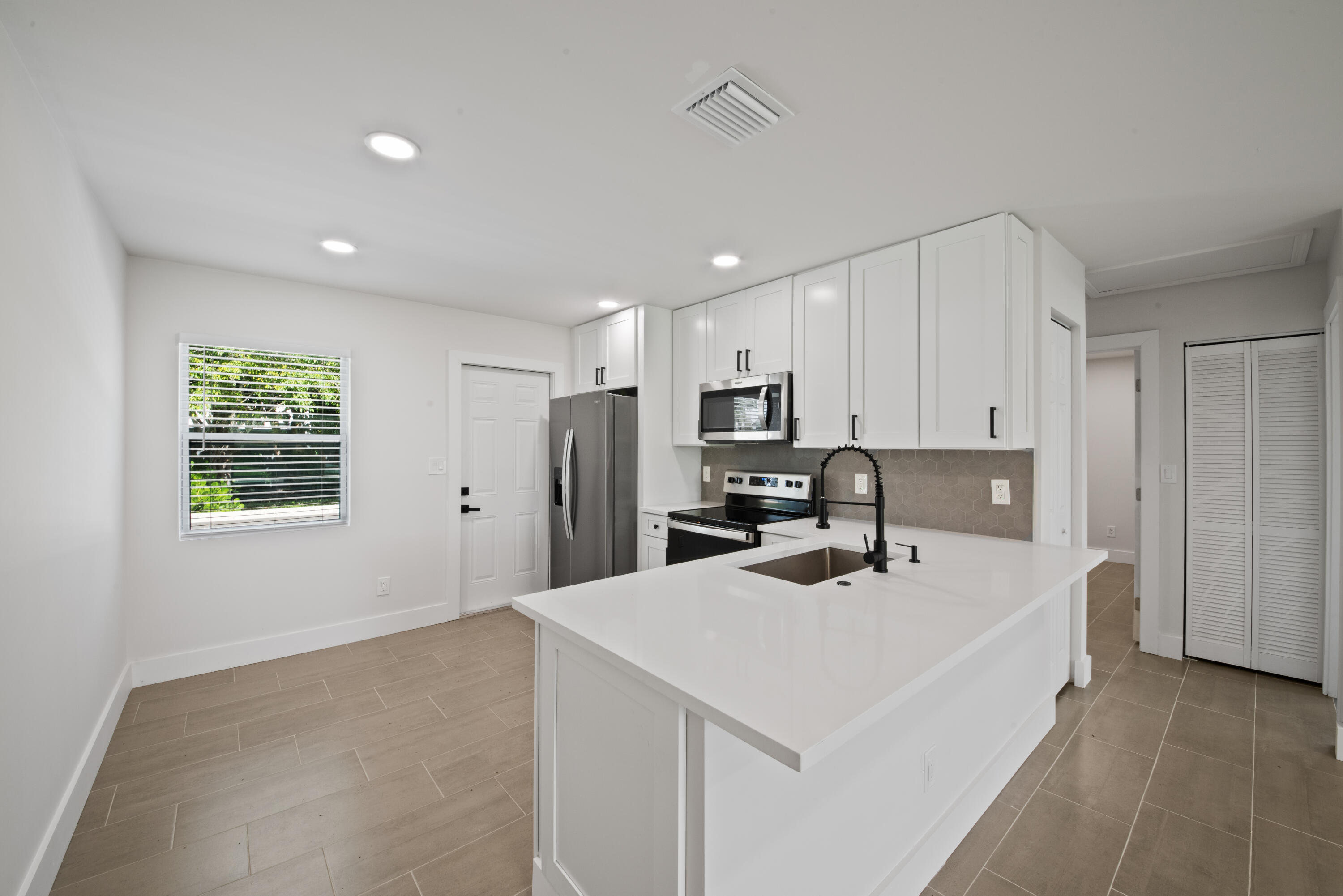823-825 NW 30th Court 1-2