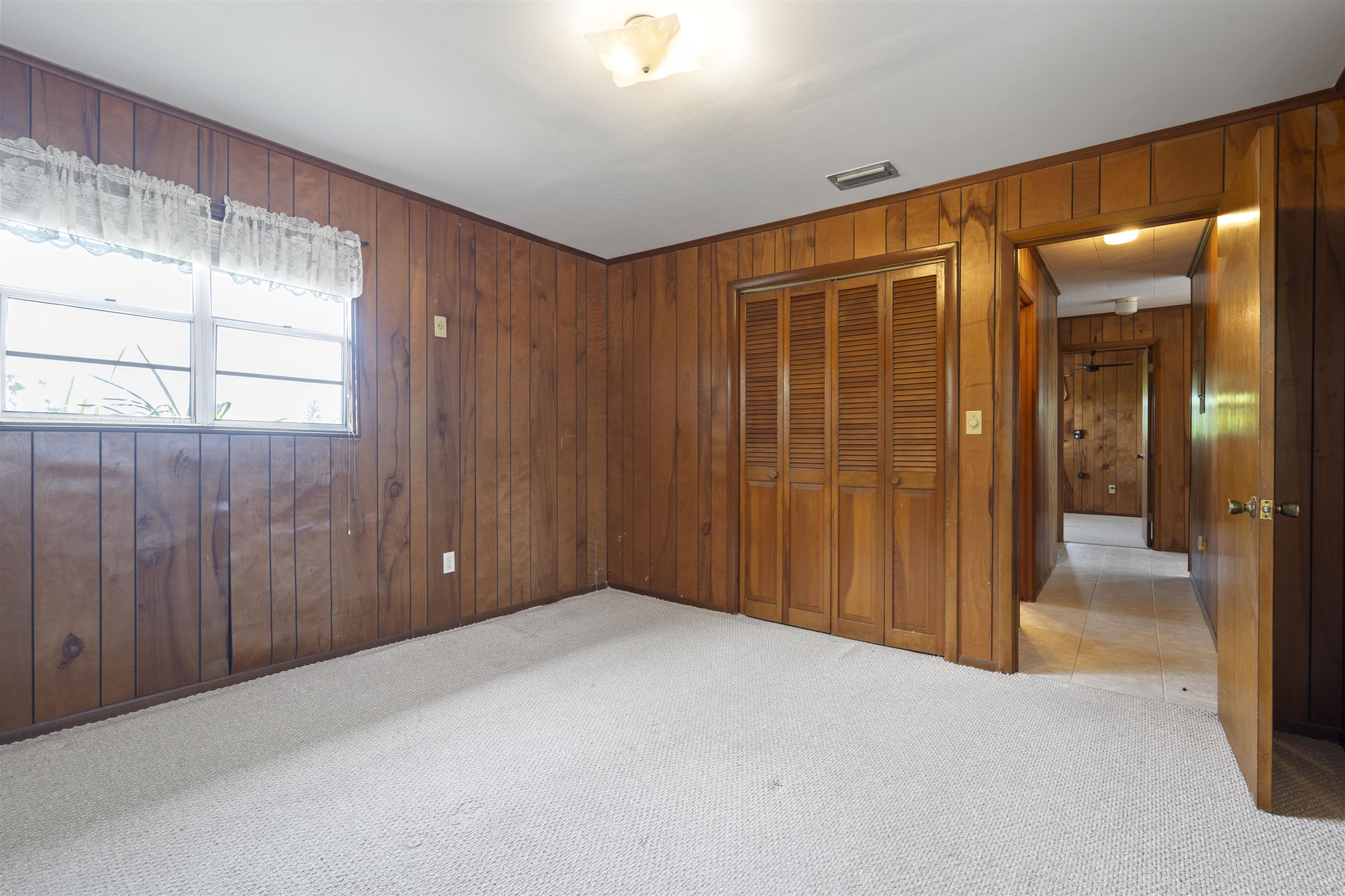 6400 Broward St with Lots 1 & 2