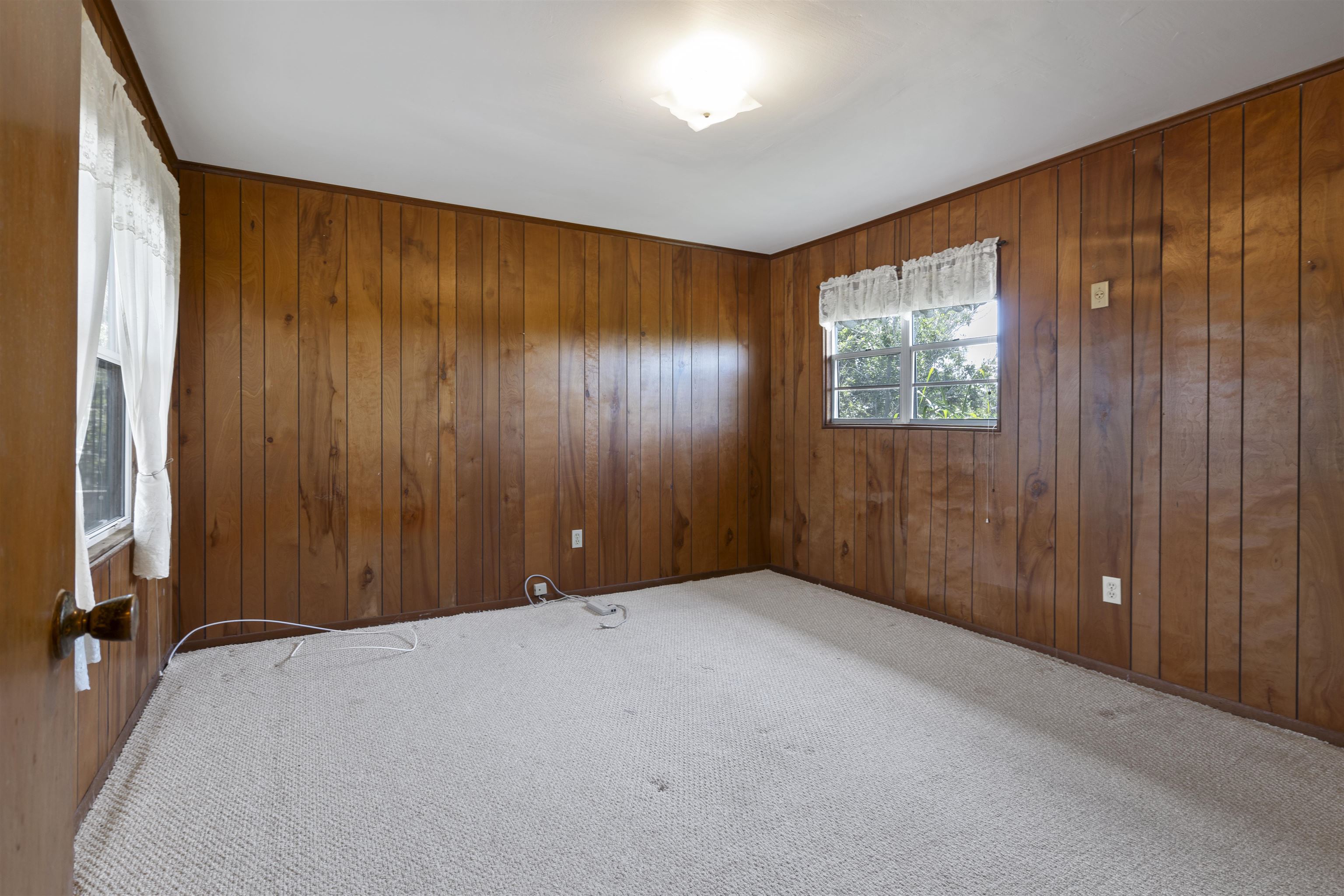 6400 Broward St with Lots 1 & 2