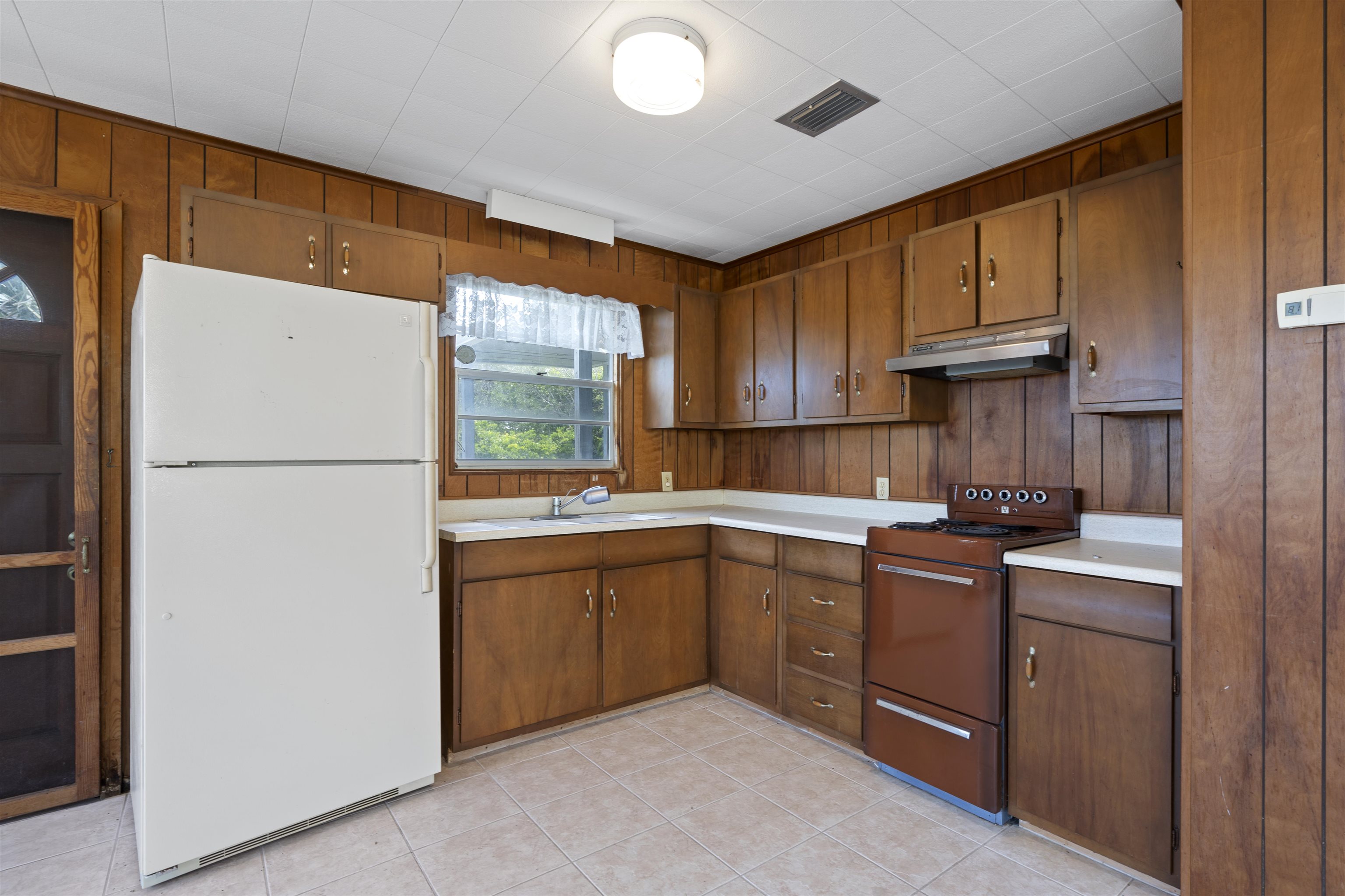 6400 Broward St with Lots 1 & 2