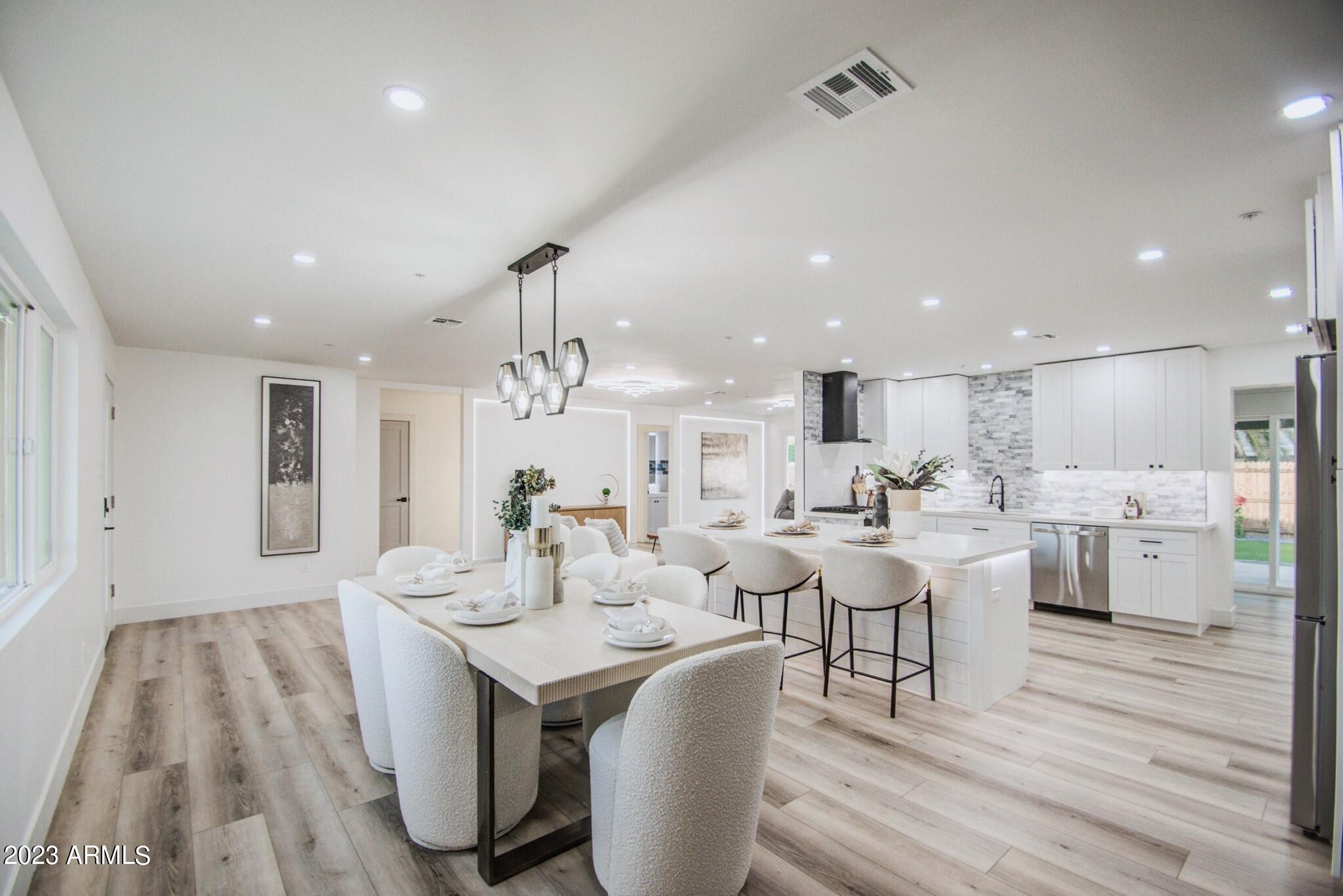 7002 E LATHAM Street