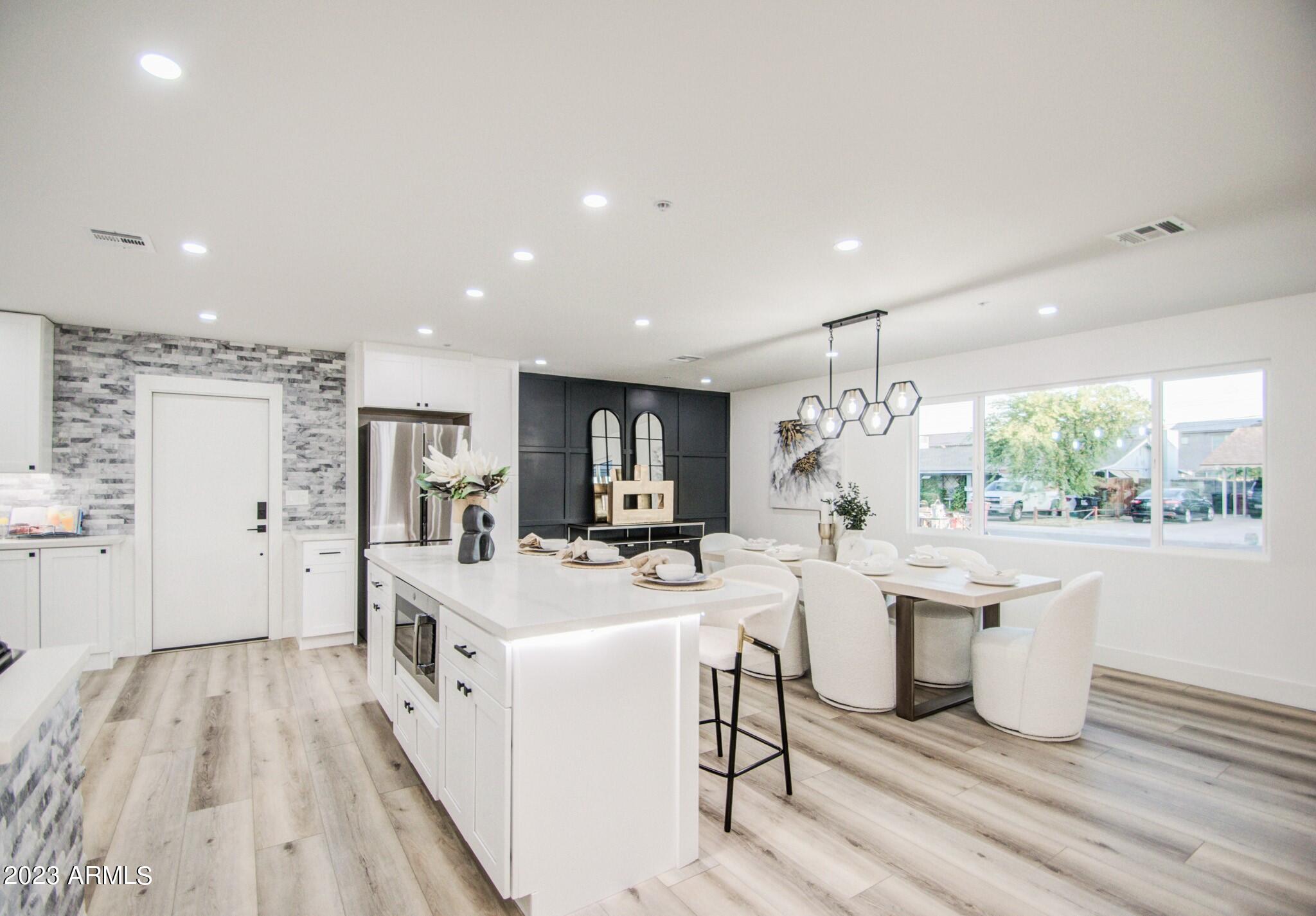 7002 E LATHAM Street