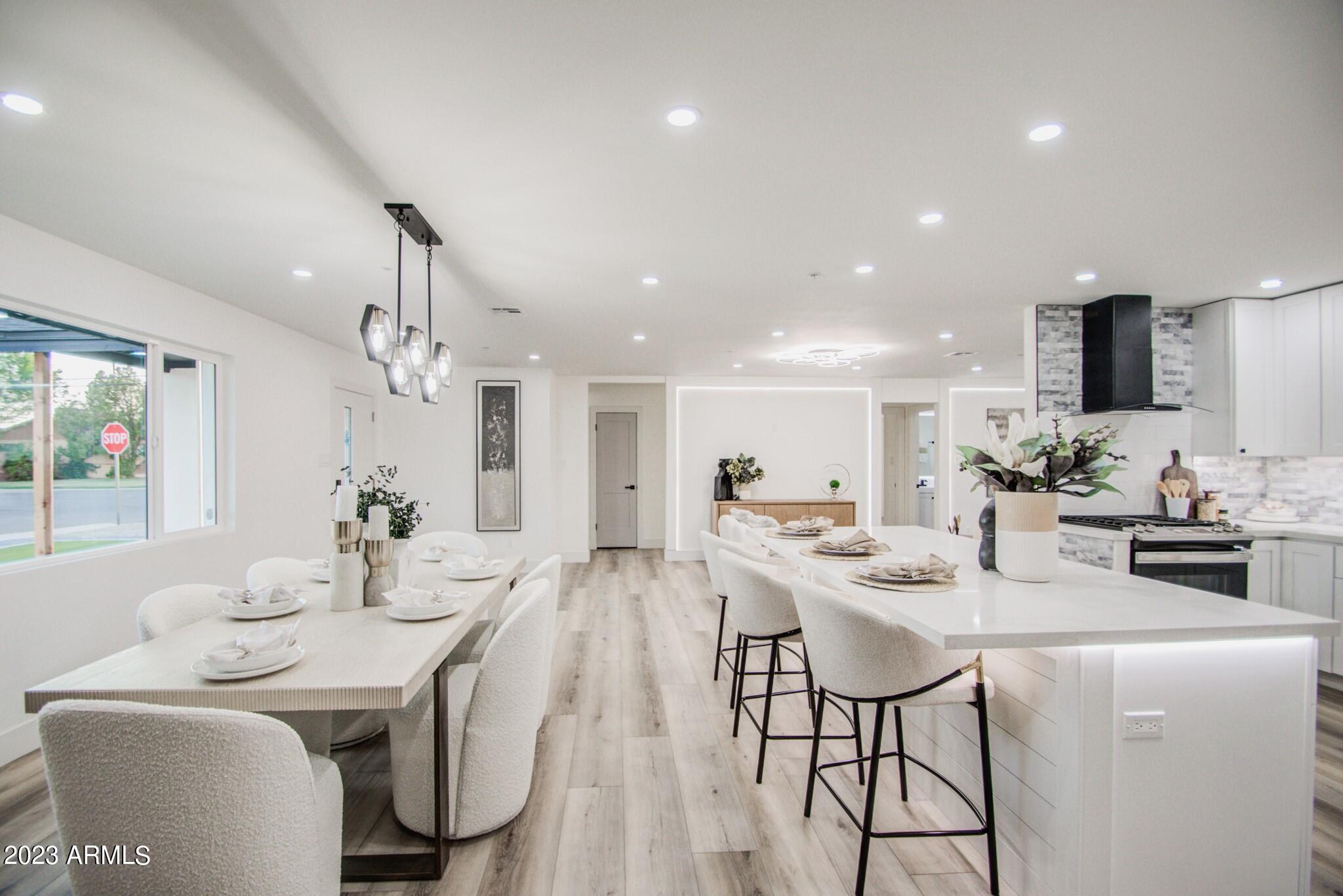 7002 E LATHAM Street