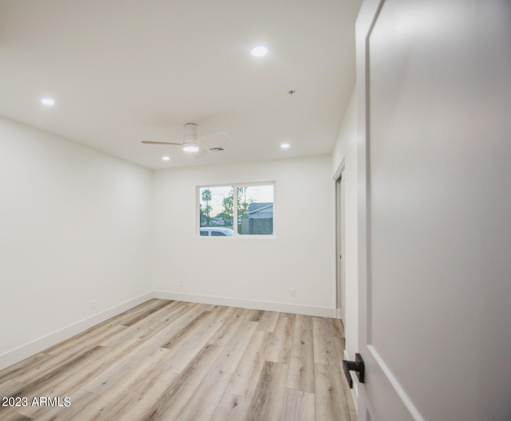 7002 E LATHAM Street