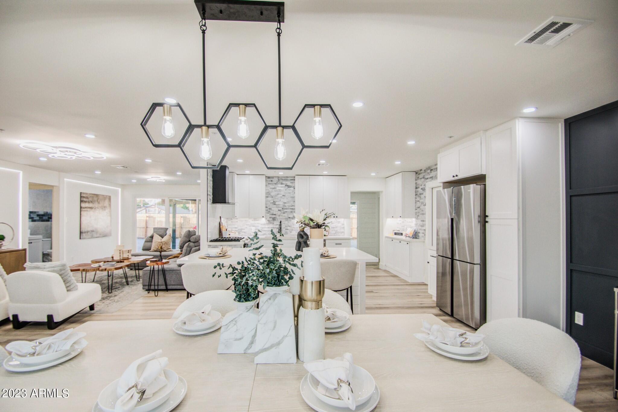 7002 E LATHAM Street