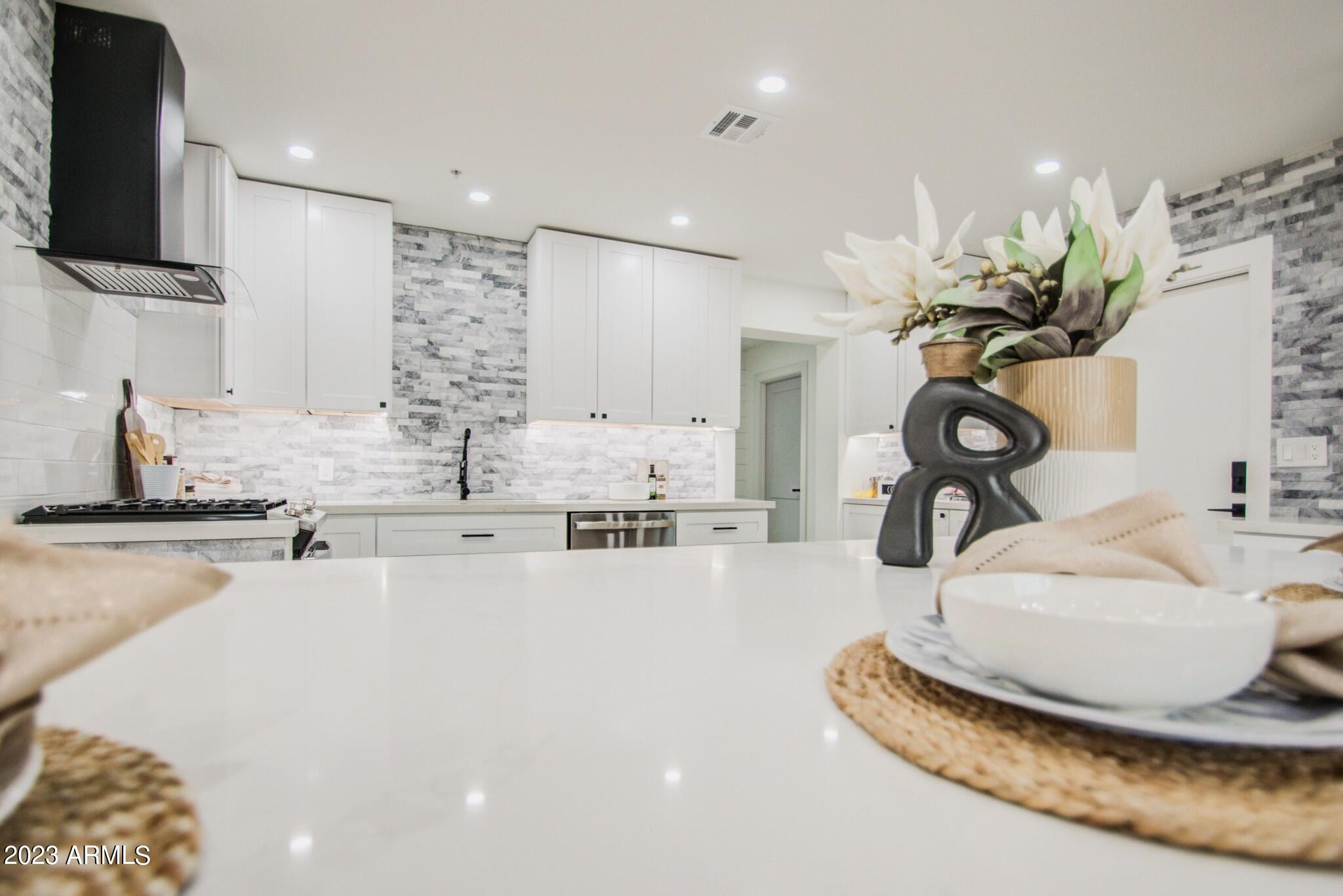 7002 E LATHAM Street