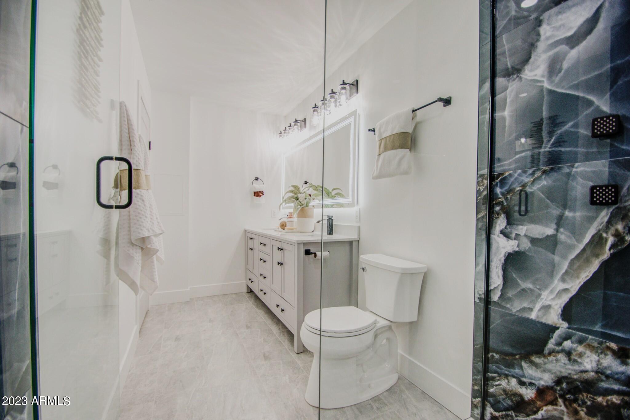 7002 E LATHAM Street