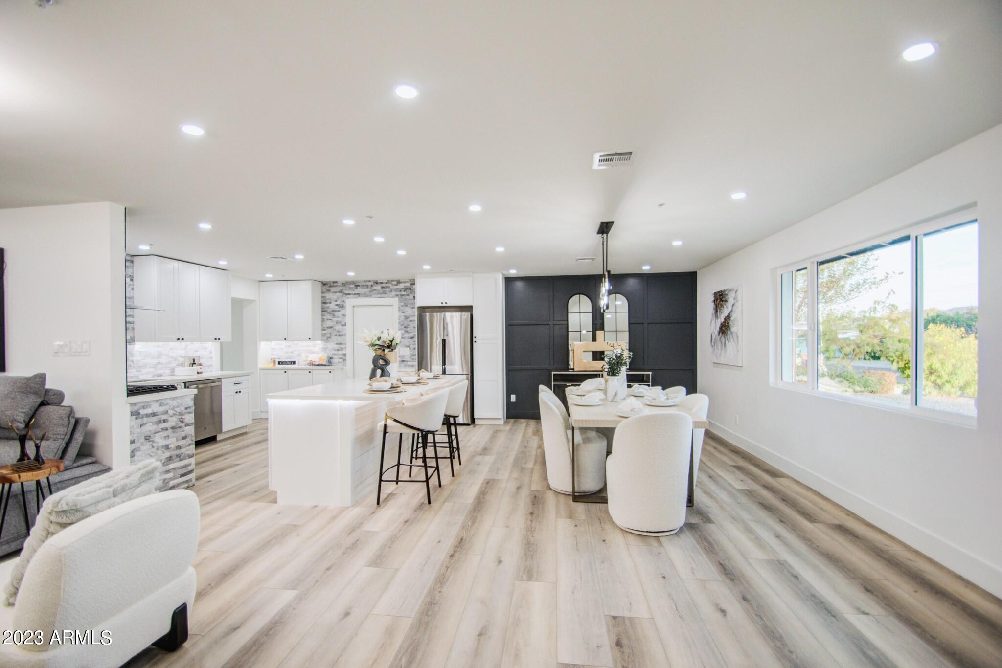 7002 E LATHAM Street