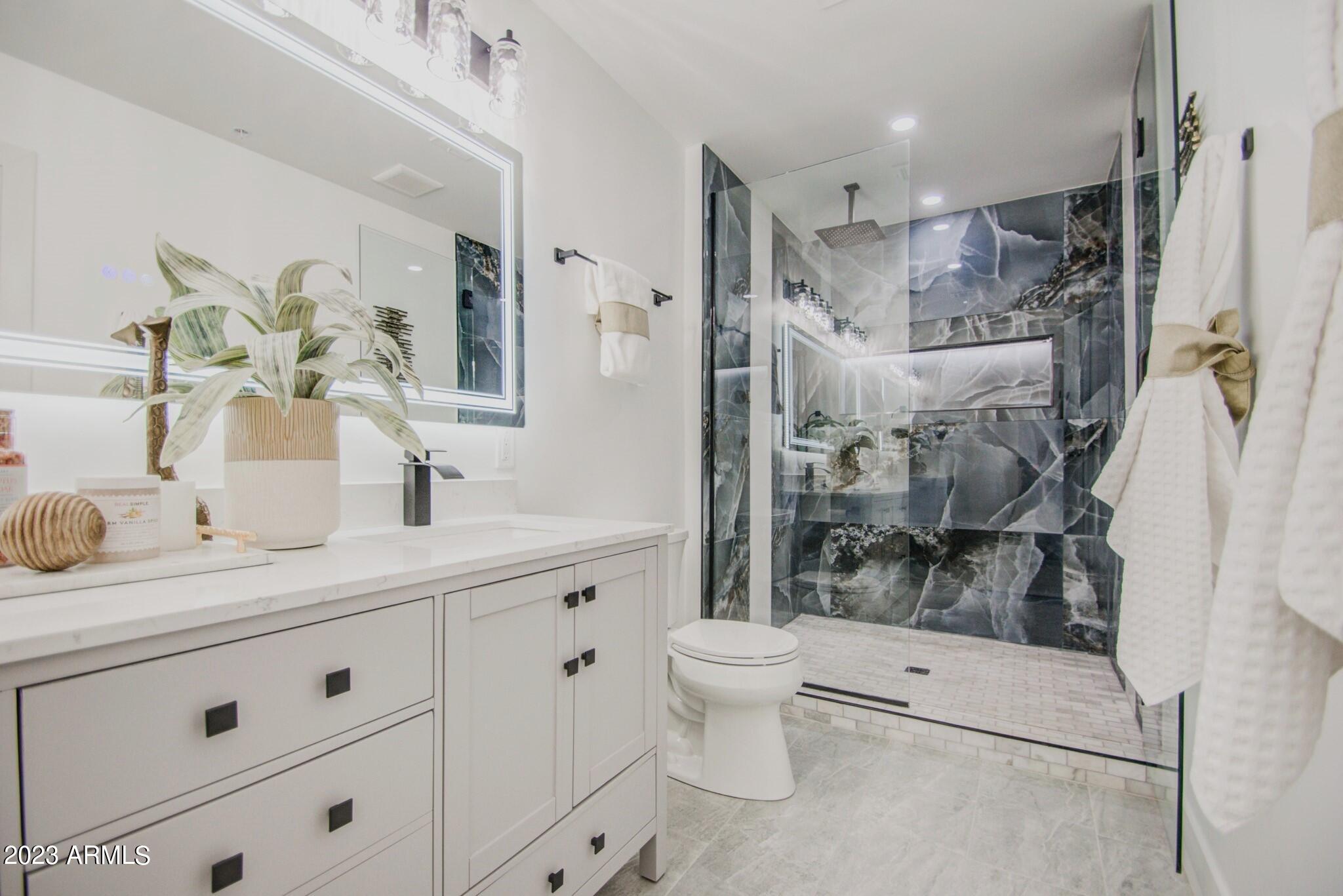 7002 E LATHAM Street