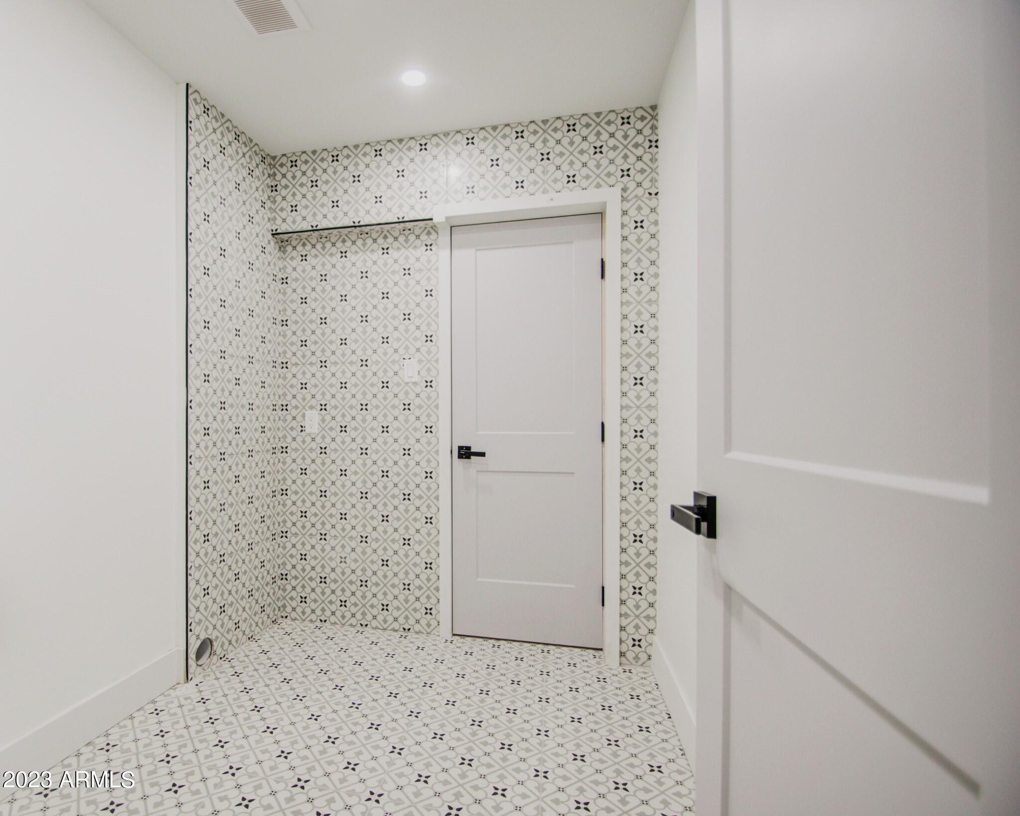 7002 E LATHAM Street