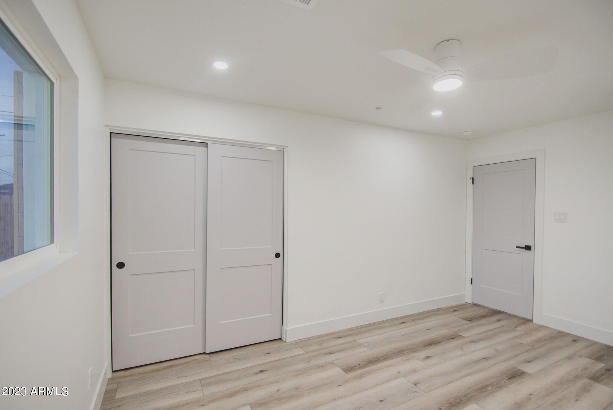 7002 E LATHAM Street