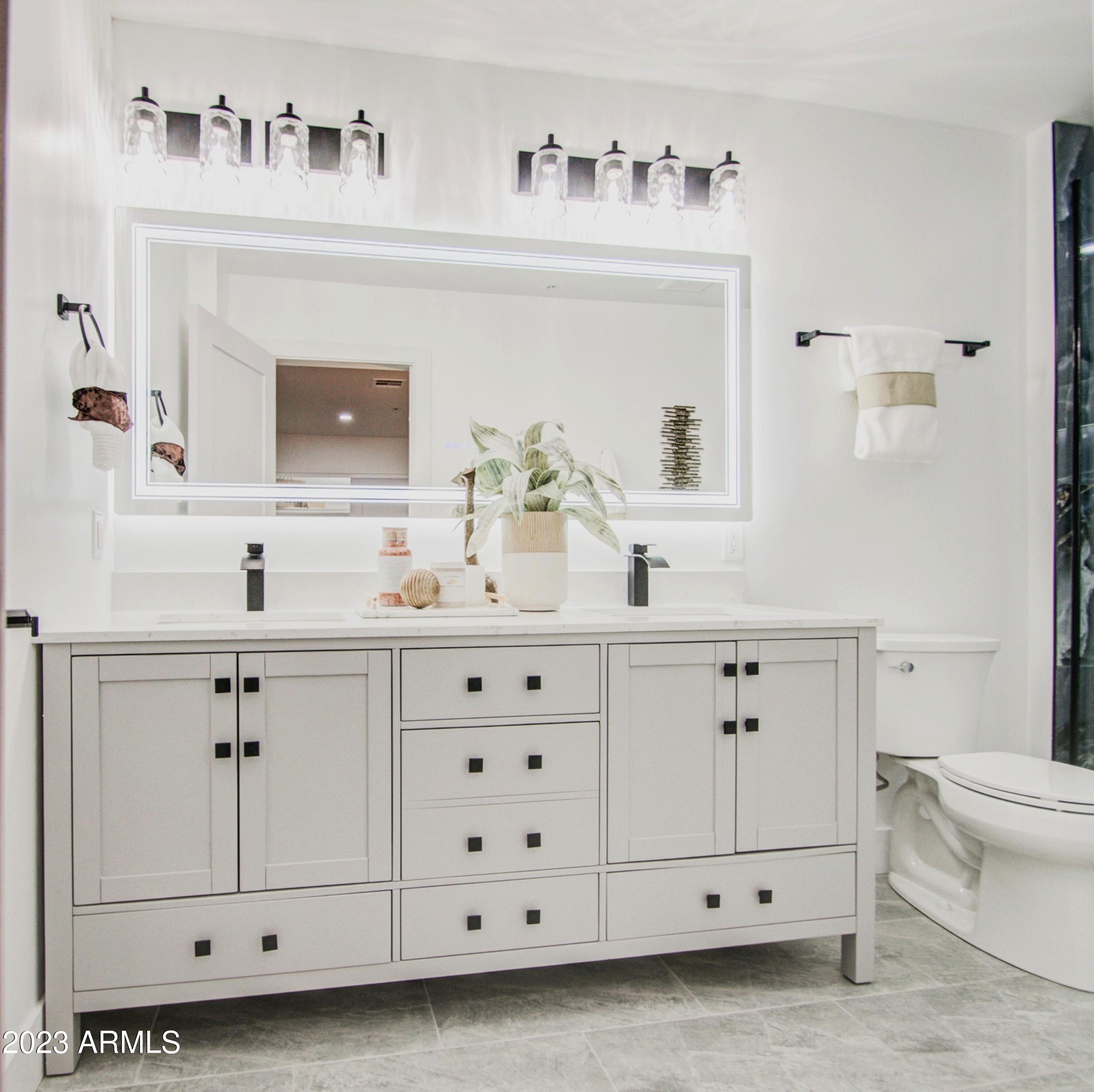 7002 E LATHAM Street