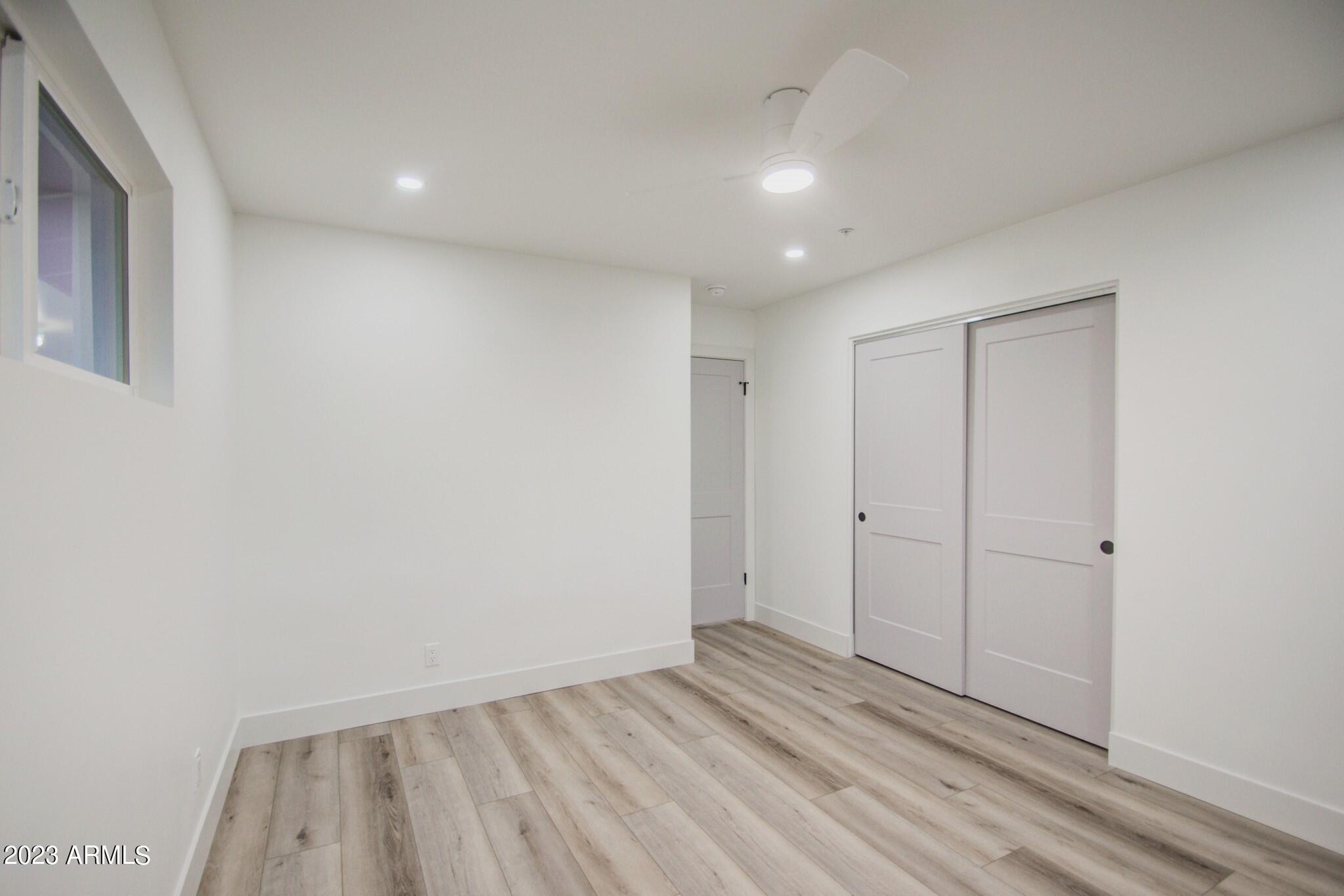 7002 E LATHAM Street