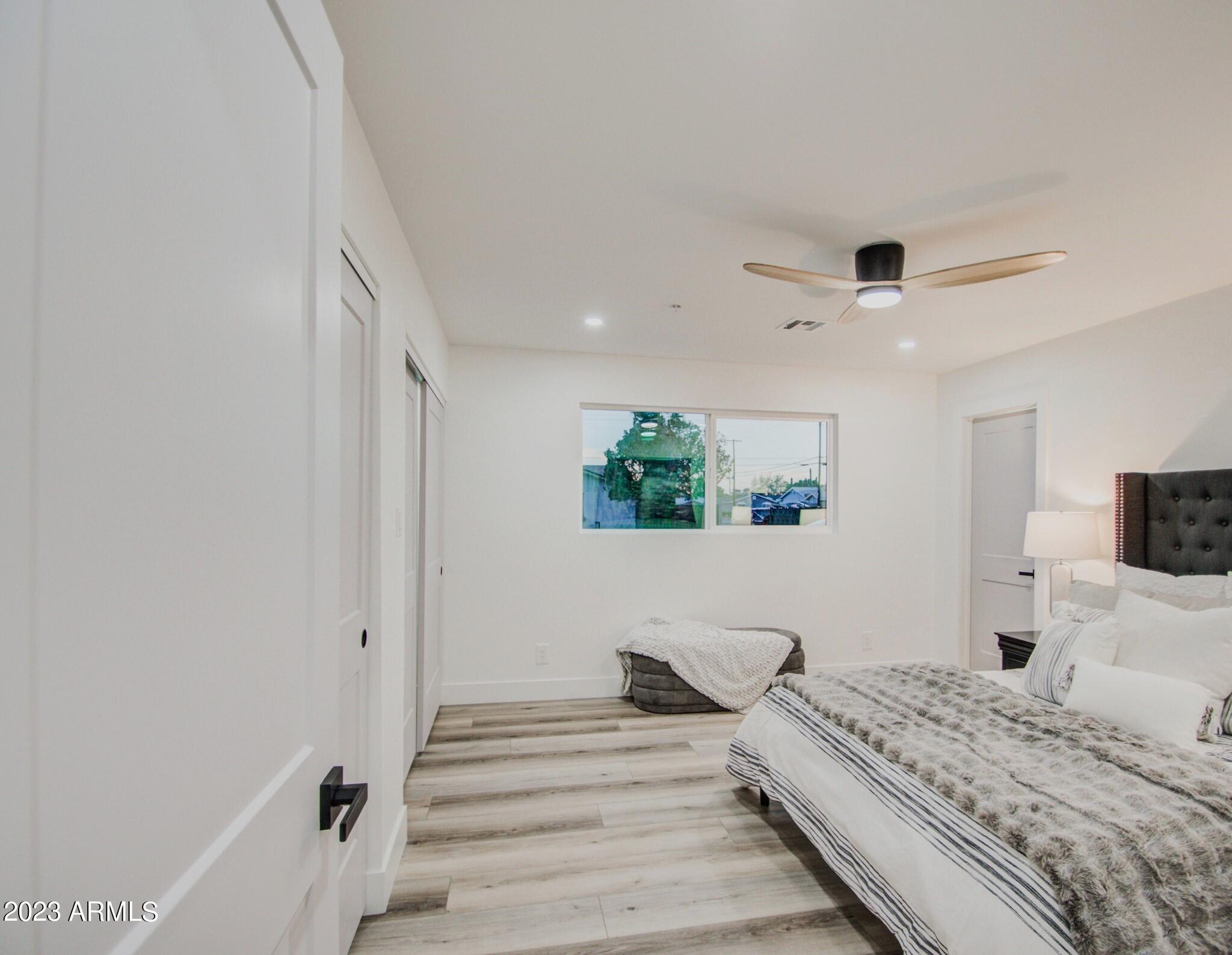 7002 E LATHAM Street