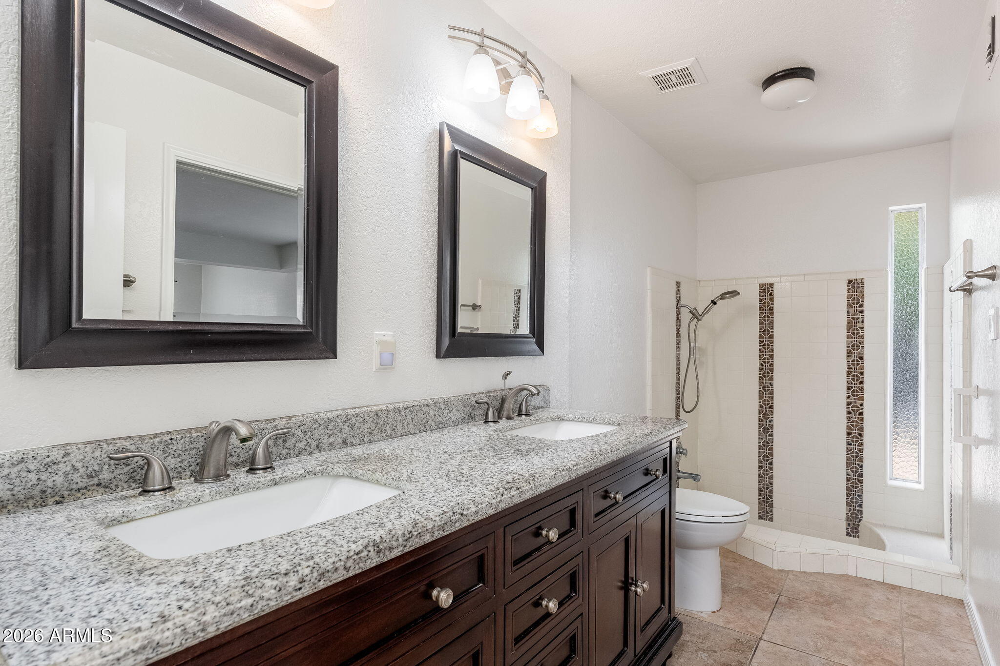 6639 E VOLTAIRE Avenue