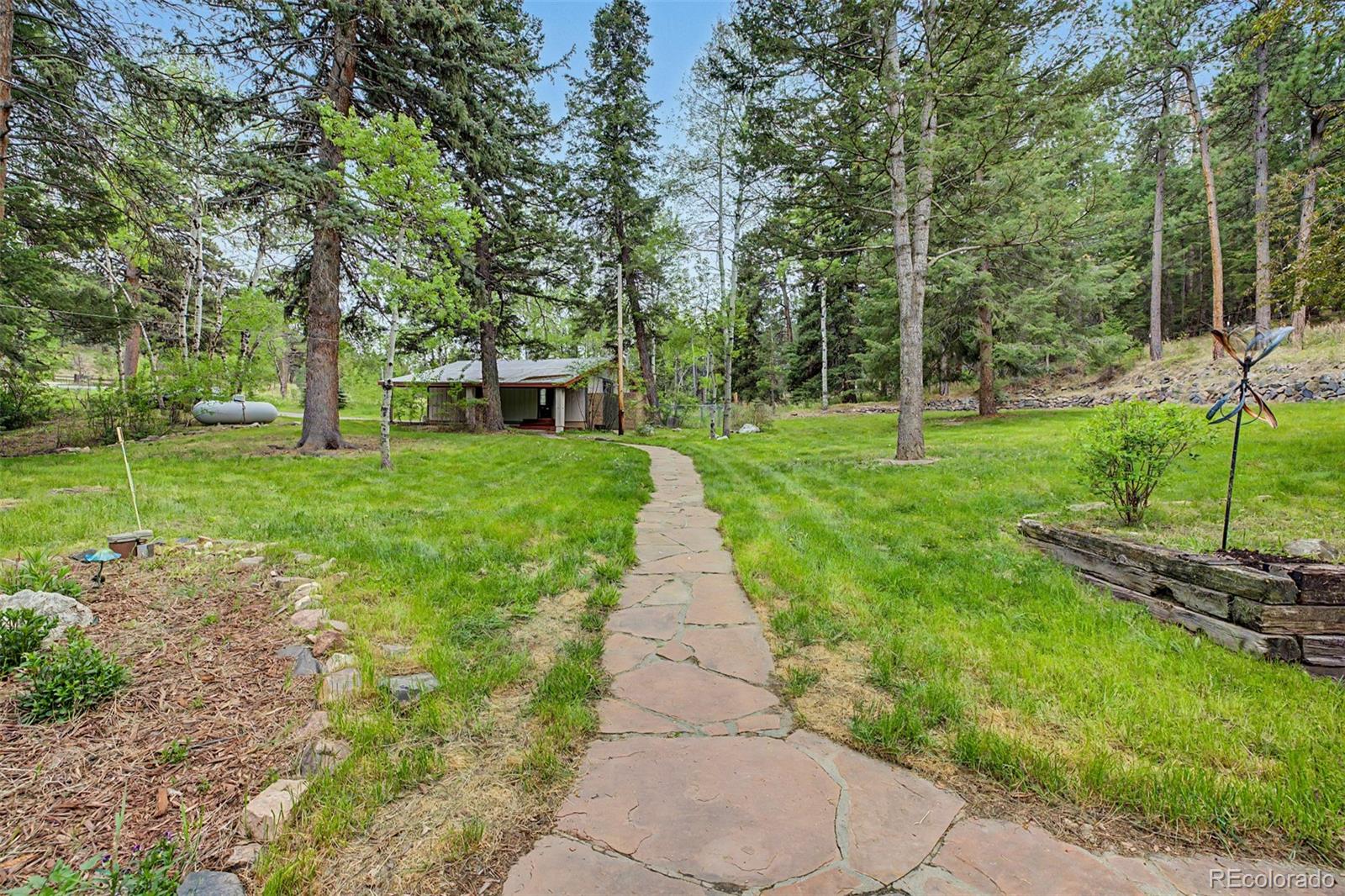 8297 S Deer Creek Canyon Road