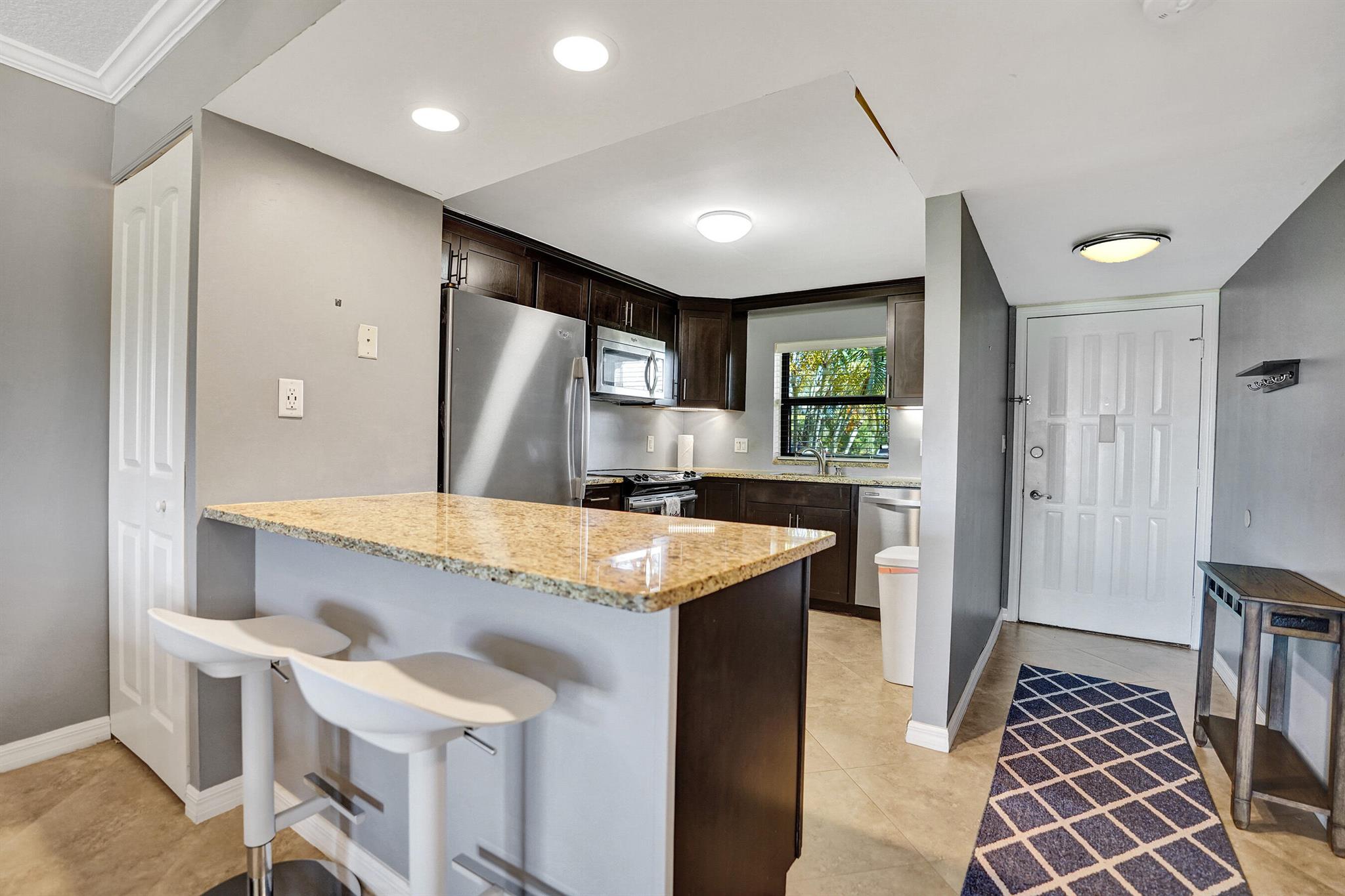 1981 W Woolbright Road E104