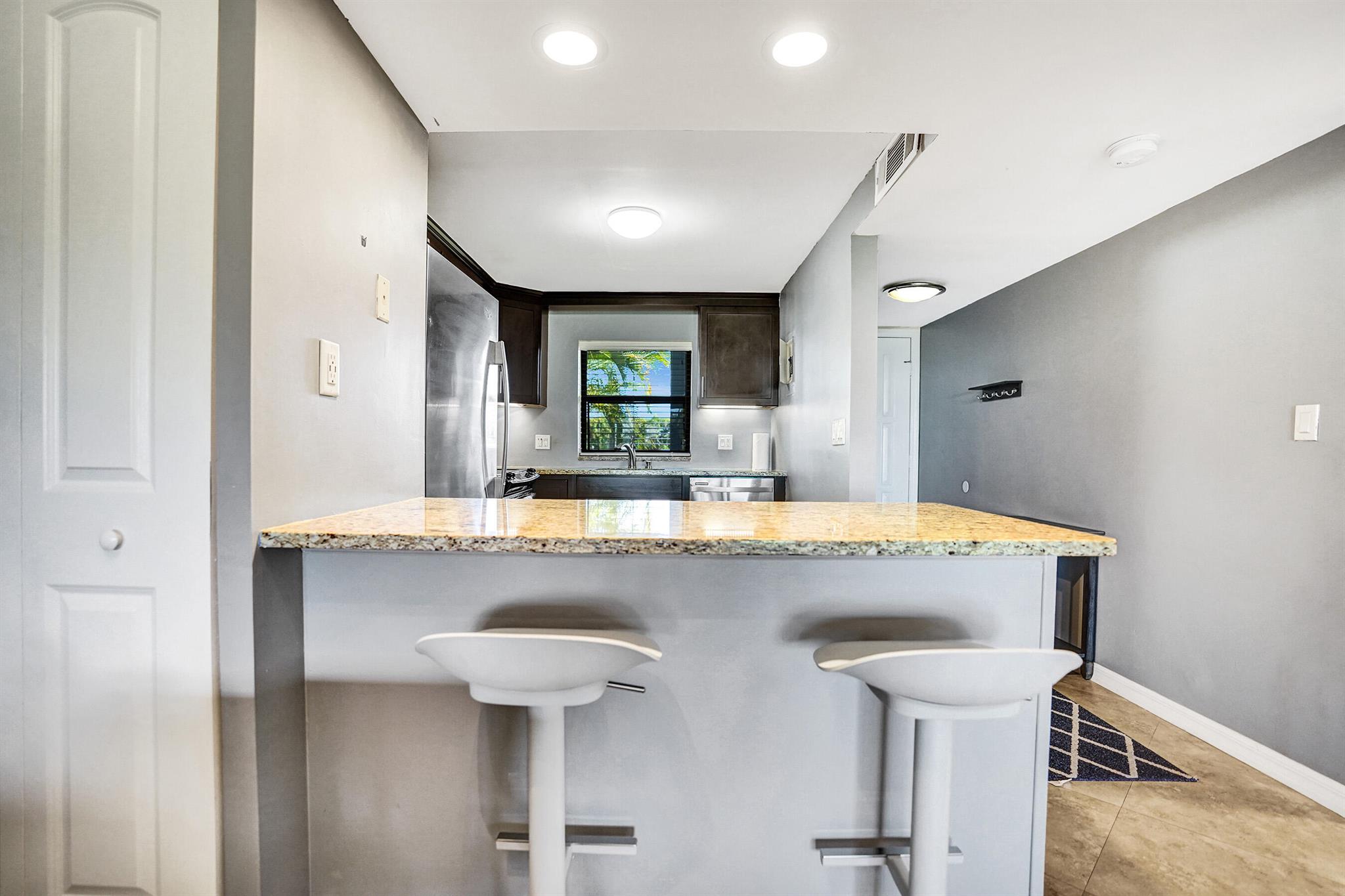 1981 W Woolbright Road E104