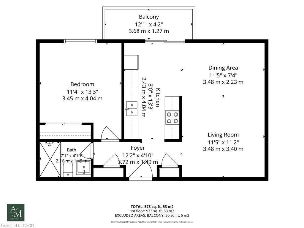 Floor plan showing a one-bedroom unit with open living and dining areas and a balcony.