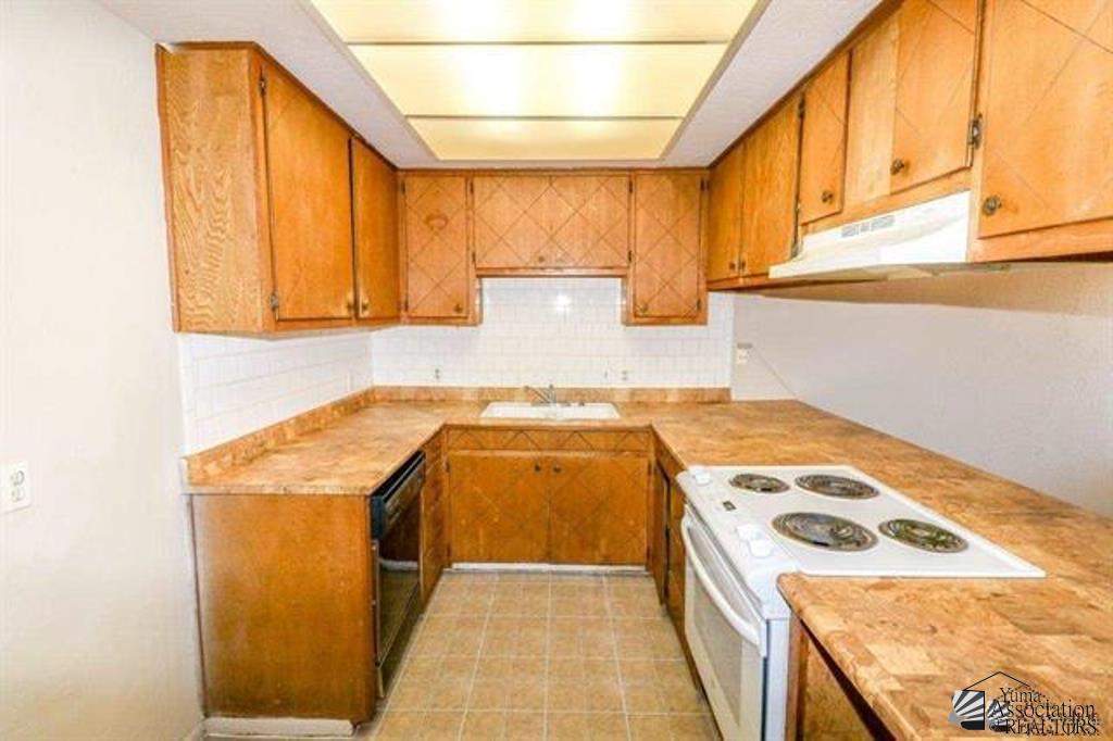 221 AND 223 W 26 St