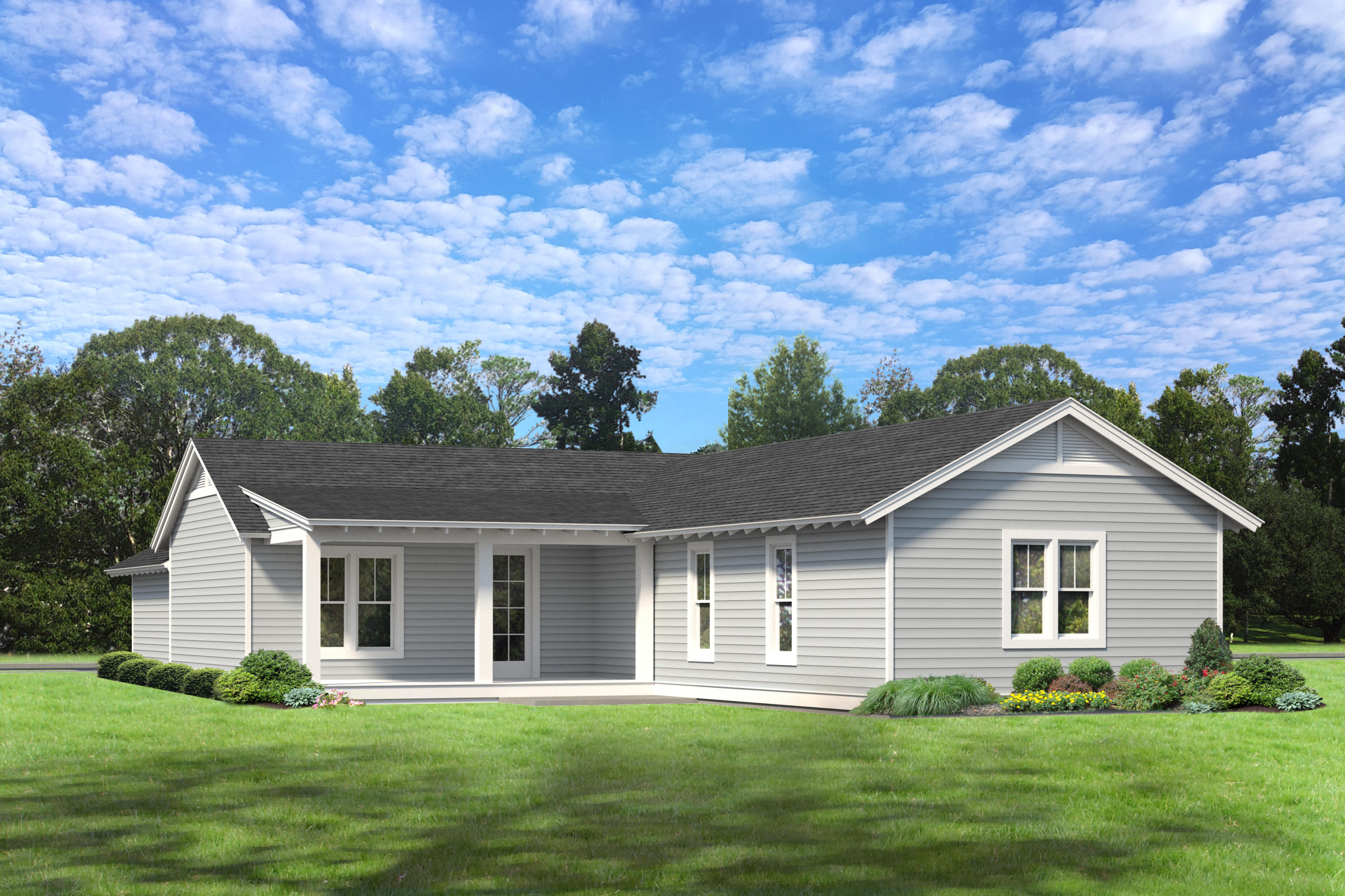 Gray single-story home with a covered porch, landscaped beds, and a broad lawn.