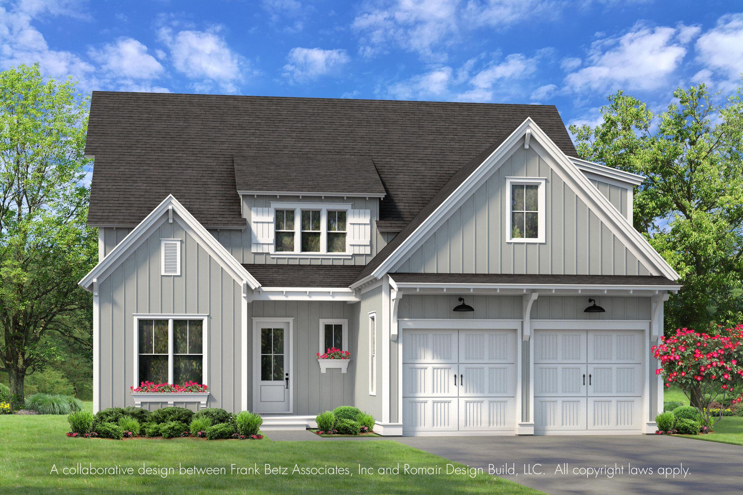 Gray two-story home with steep gables, white trim, a double garage, and flowering landscaping.