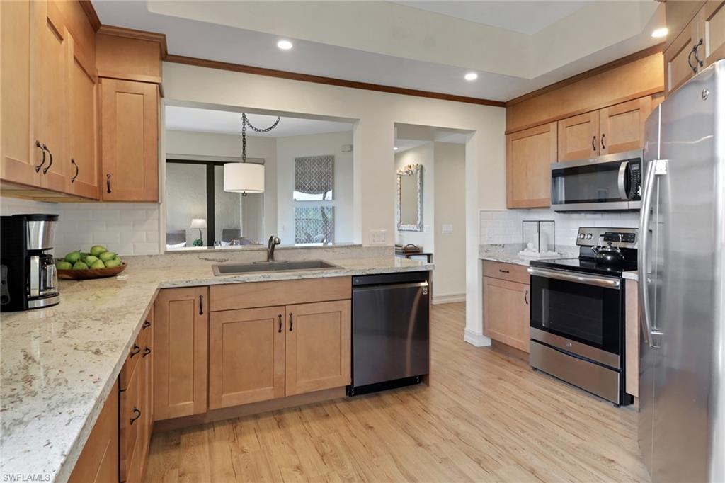 7008 Pelican Bay BLVD H302