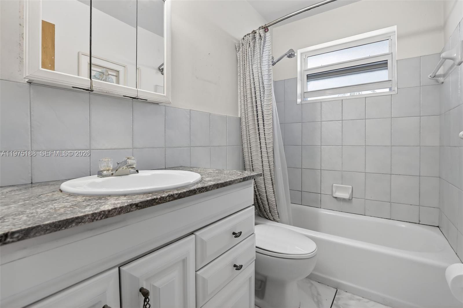 4825 NE 23rd Ave # 7 Unit: 1-7