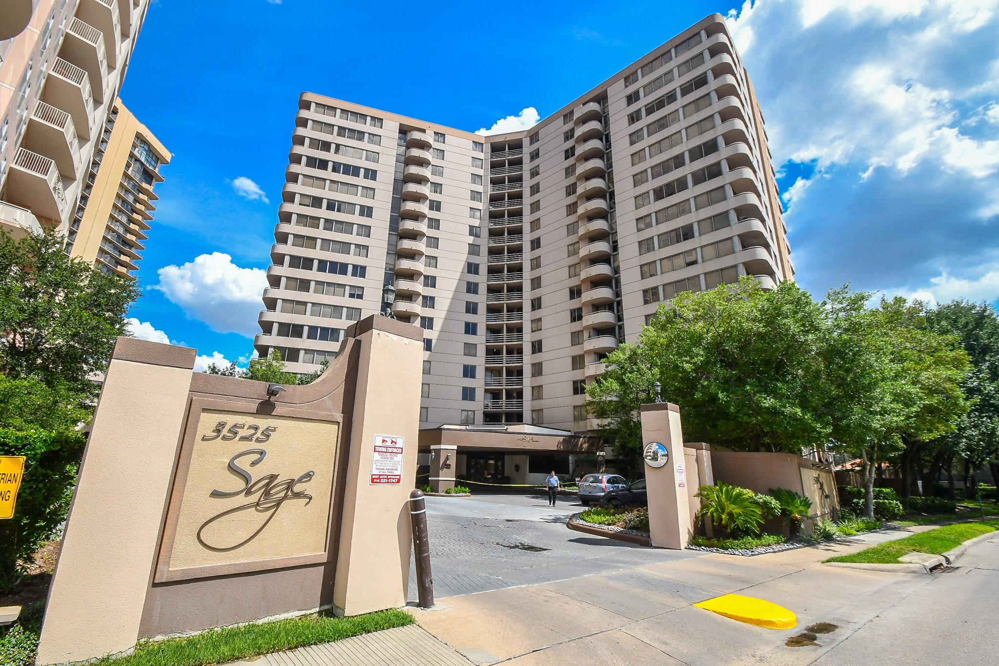 Sage high-rise condominium entrance with a prominent 3525 Sage sign.