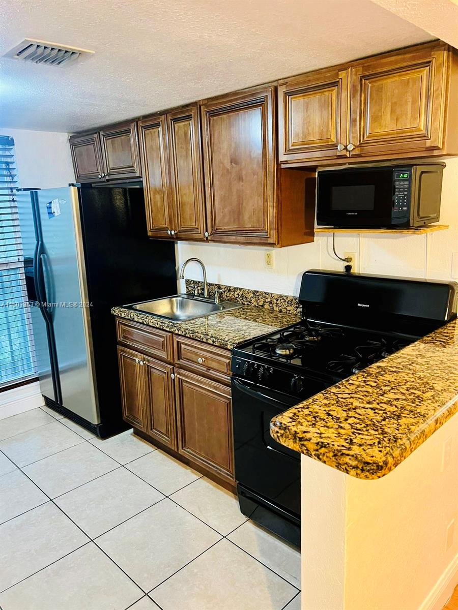241 S Royal Poinciana Blvd # 302