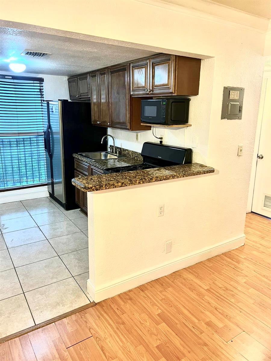 241 S Royal Poinciana Blvd # 302