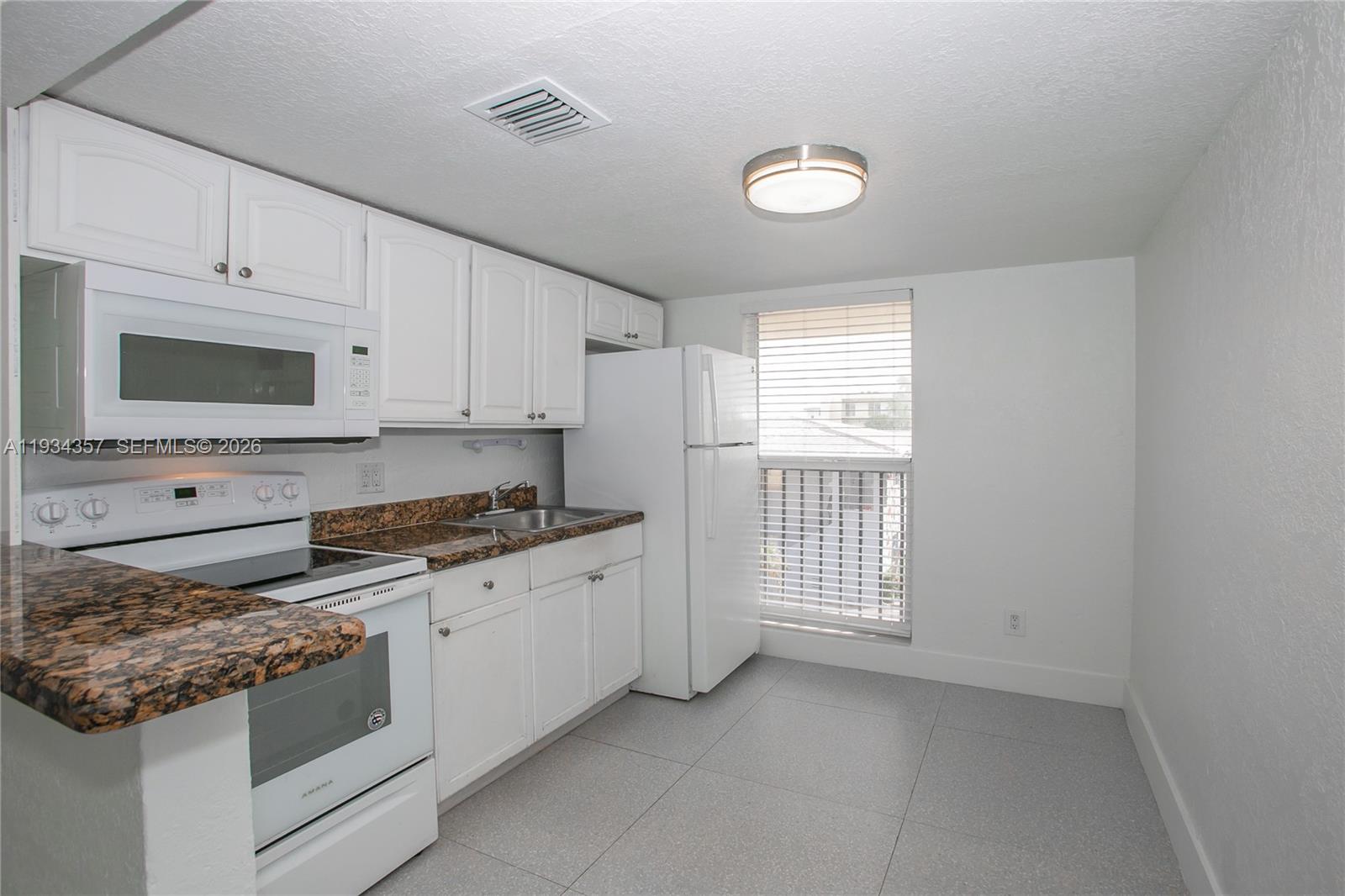 241 S Royal Poinciana Blvd # 305